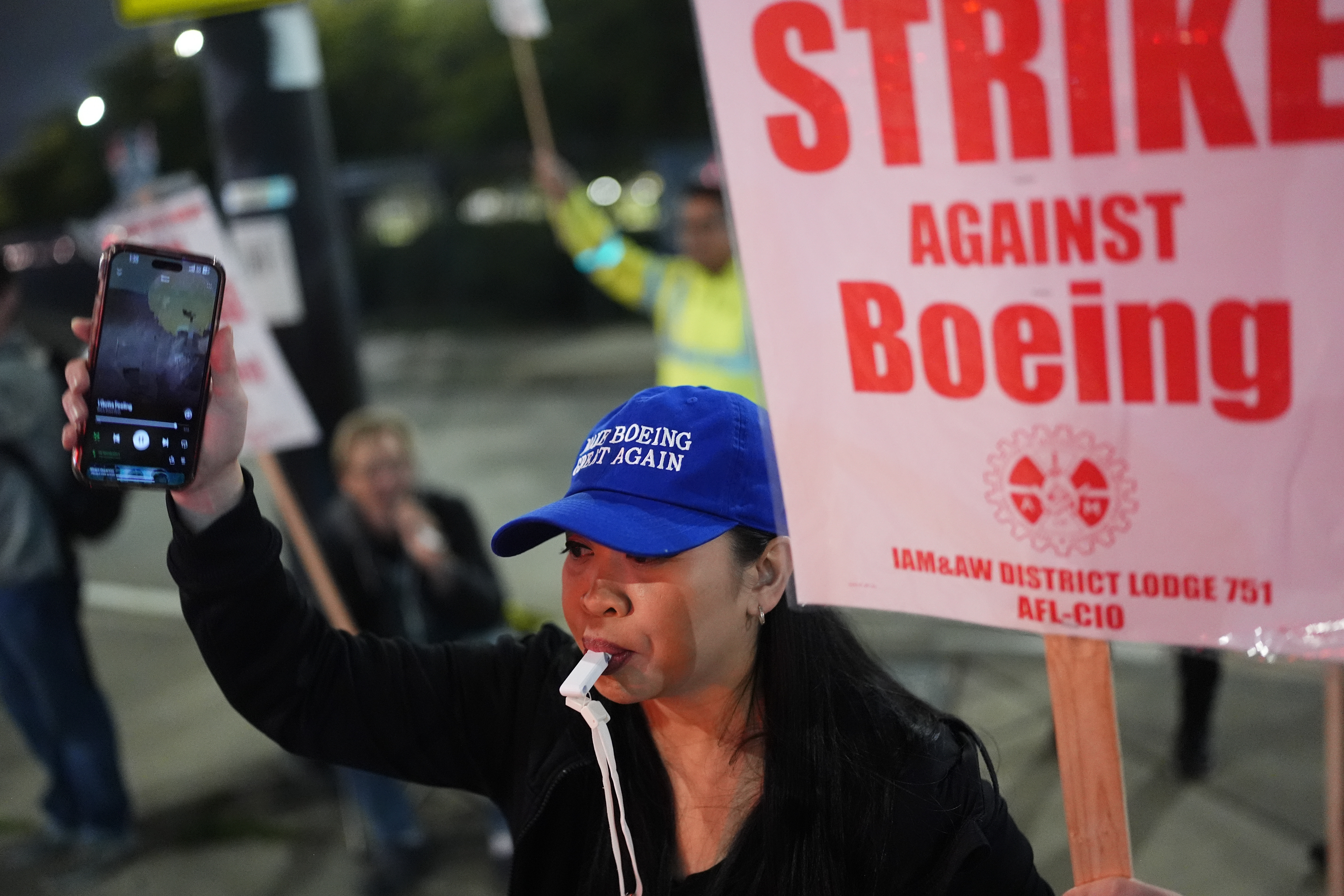 Boeing employee Ritz Amador, 40, who works as a customer coordinator, wears a &quot;Make Boeing Great Again&quot; cap while picketing after union members voted overwhelmingly to reject a contract offer and go on strike Friday, Sept. 13, 2024, outside the company&#039;s factory in Renton, Wash.<br />(Lindsey Wasson / AP Photo)