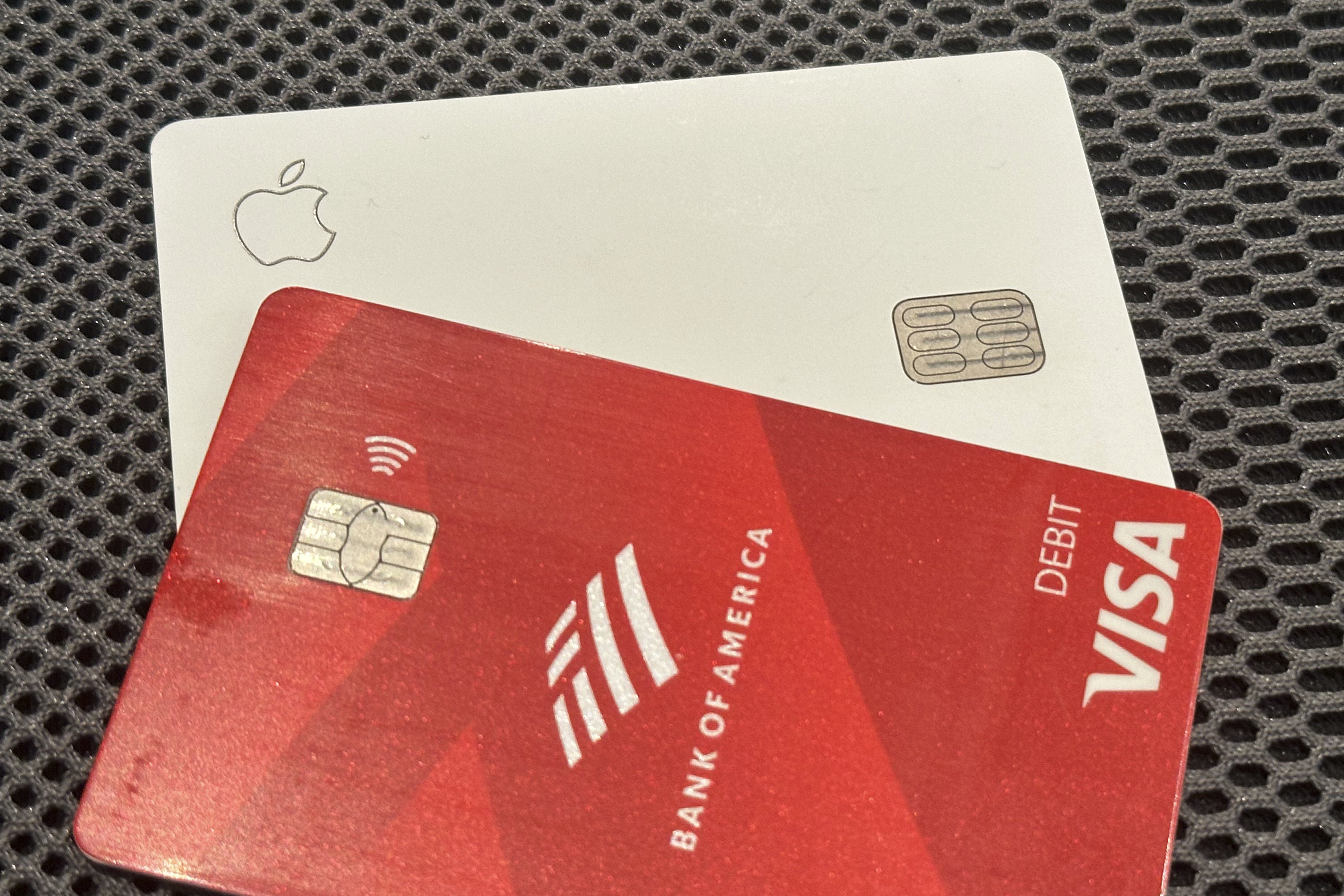 An Apple credit card is shown with a Visa debit card in a photo taken in New York on Tuesday, Sept. 24, 2024.<br />(Peter Morgan / AP Photo)