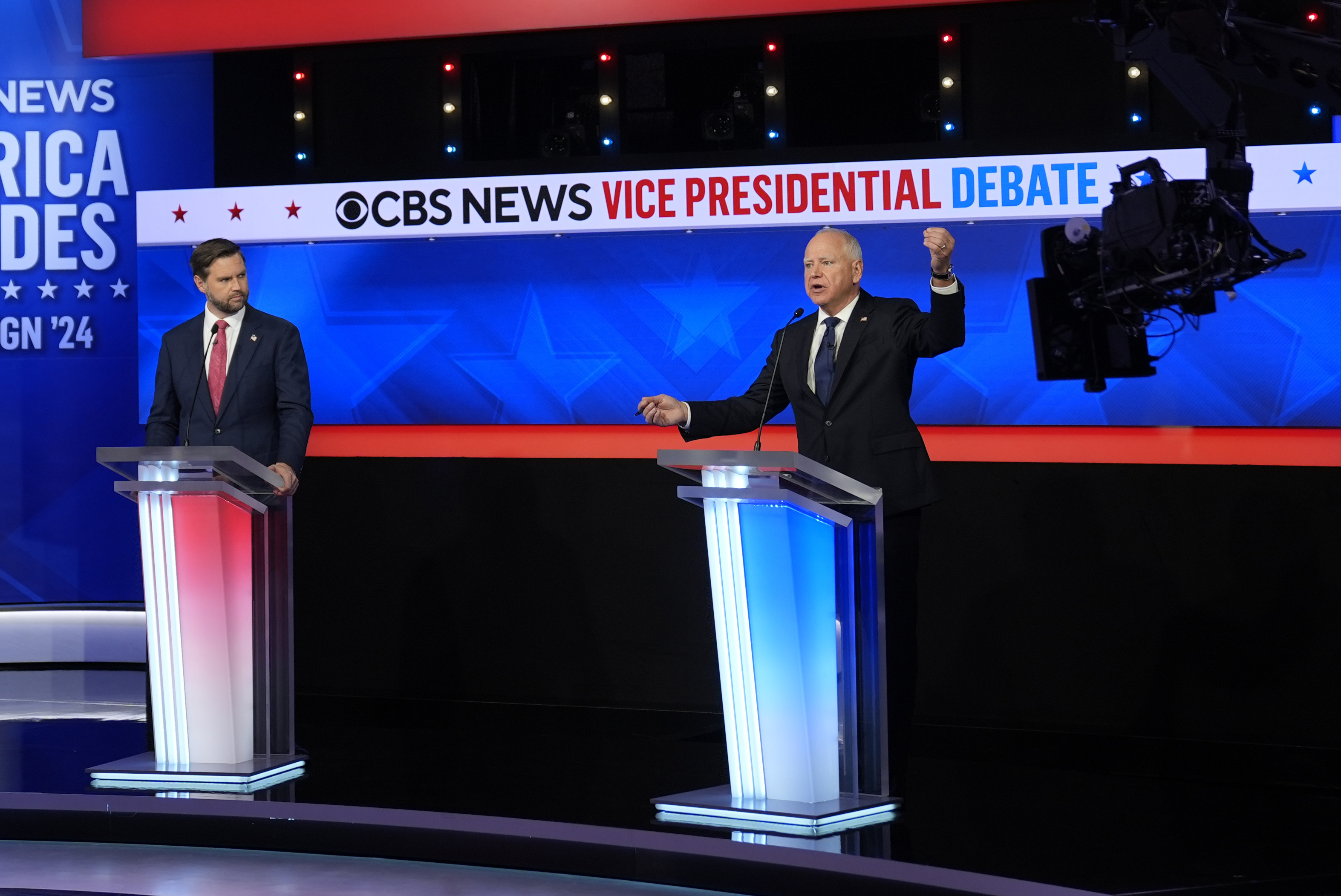 Democratic vice presidential nominee Minnesota Gov. Tim Walz (right) speaks during a vice presidential debate hosted by CBS News, with Republican vice presidential nominee Sen. JD Vance, R-Ohio (left), Tuesday, Oct. 1, 2024, in New York.<br />(Matt Rourke / AP Photo)