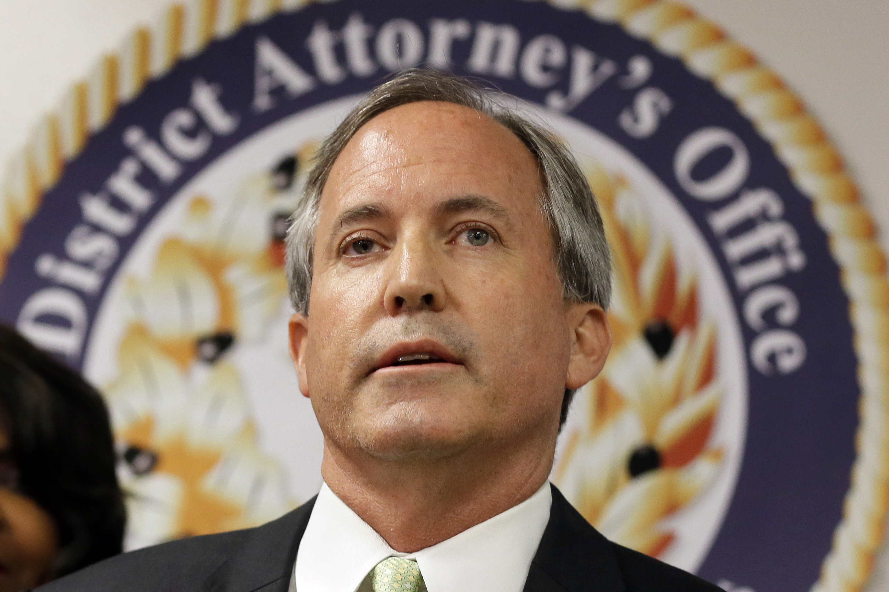 Texas Attorney General Ken Paxton speaks at a news conference in Dallas on June 22, 2017.<br />(Tony Gutierrez / AP Photo)