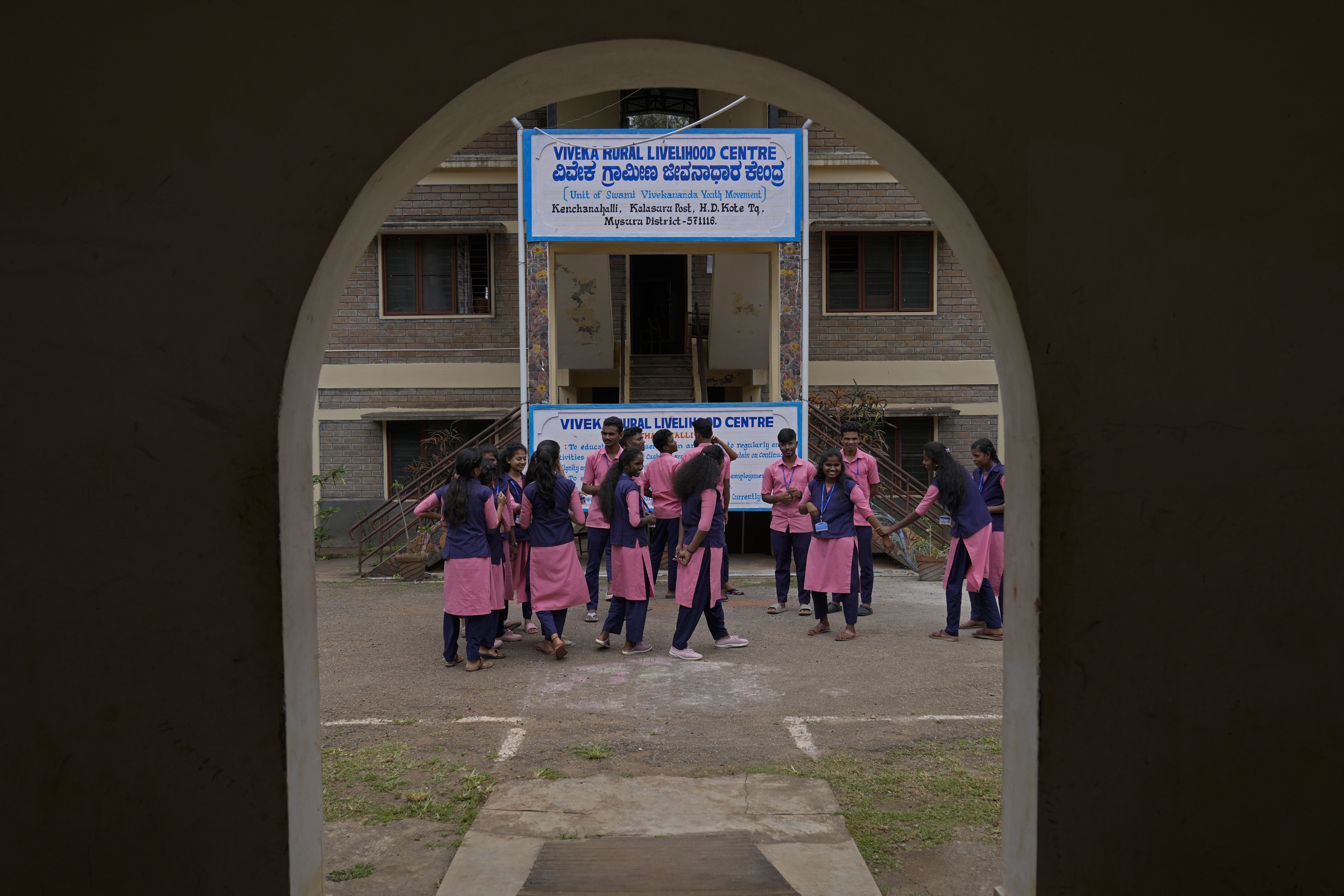 Students enrolled for professional training courses interact during a break, at the campus of the Swami Vivekananda Youth Movement.<br />(Aijaz Rahi / AP Photo)