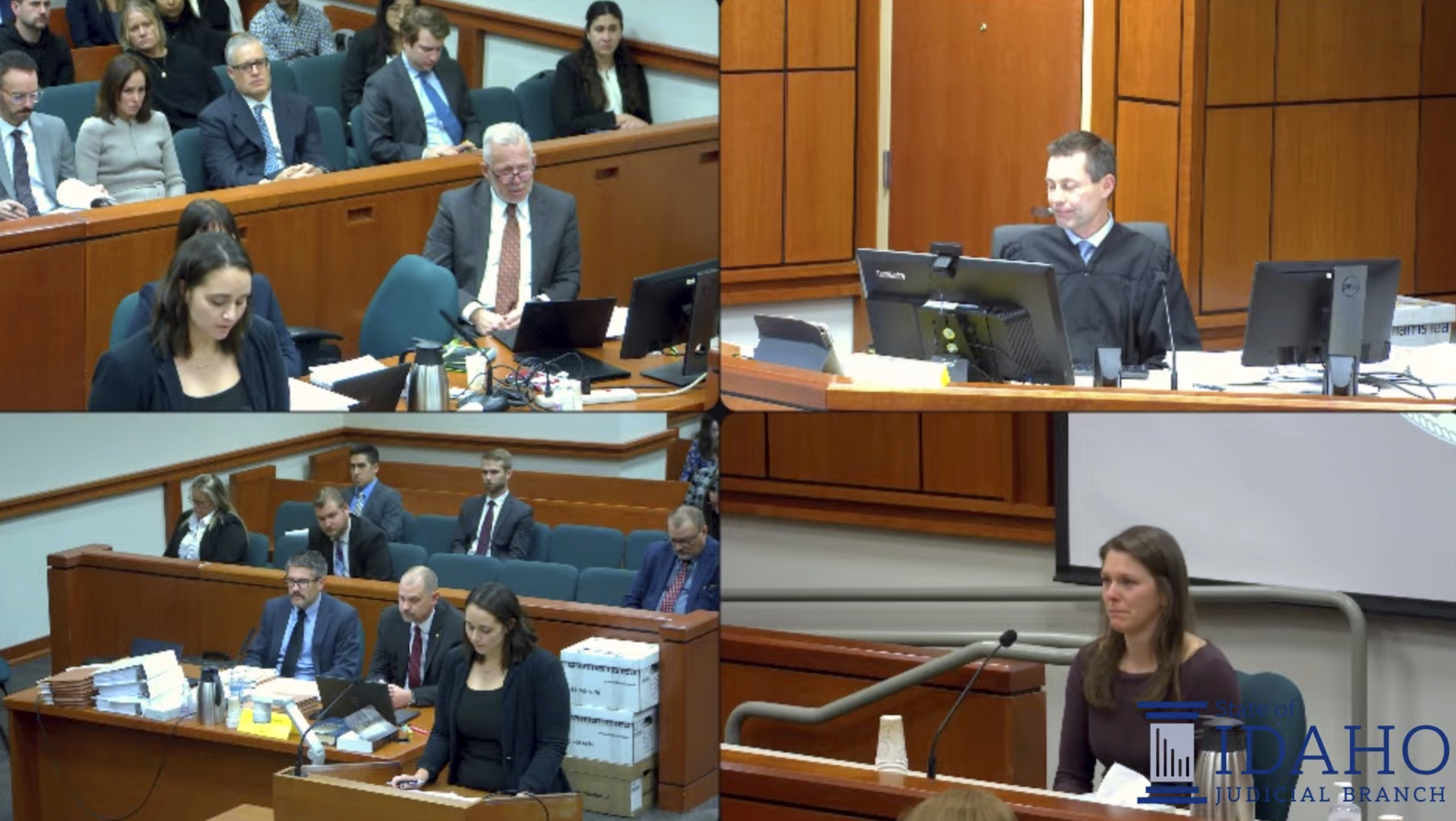 In this image taken from a video provided by Idaho Fourth District Court, Rebecca Vincen-Brown (lower right) tears up as she testifies in court about her abortion, Tuesday, Nov. 12, 2024, in Boise, Idaho.<br />(Idaho Fourth District Court via AP)