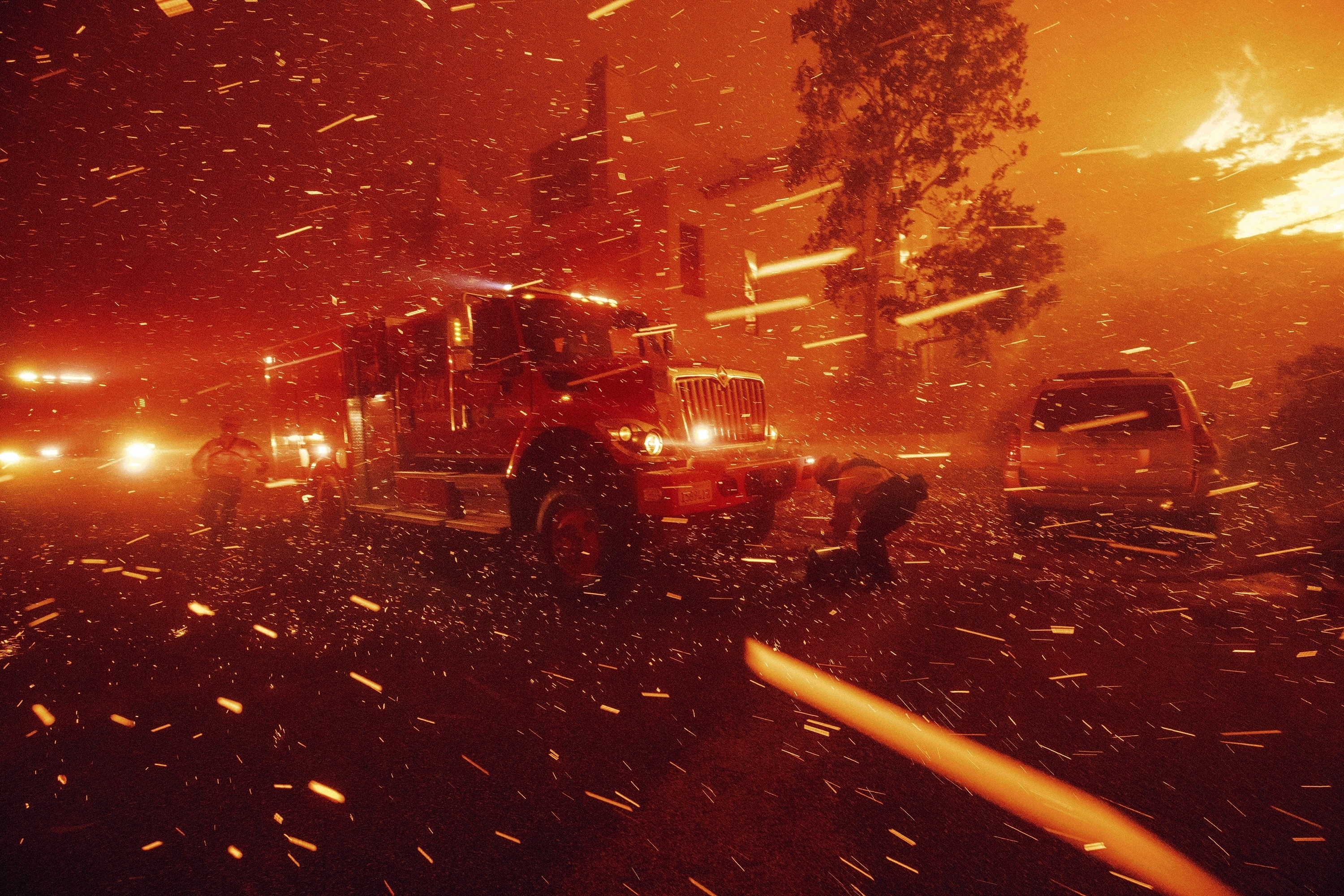 Firefighters battle the Franklin Fire in Malibu, Calif., Dec. 10, 2024.<br />(Ethan Swope / AP Photo)