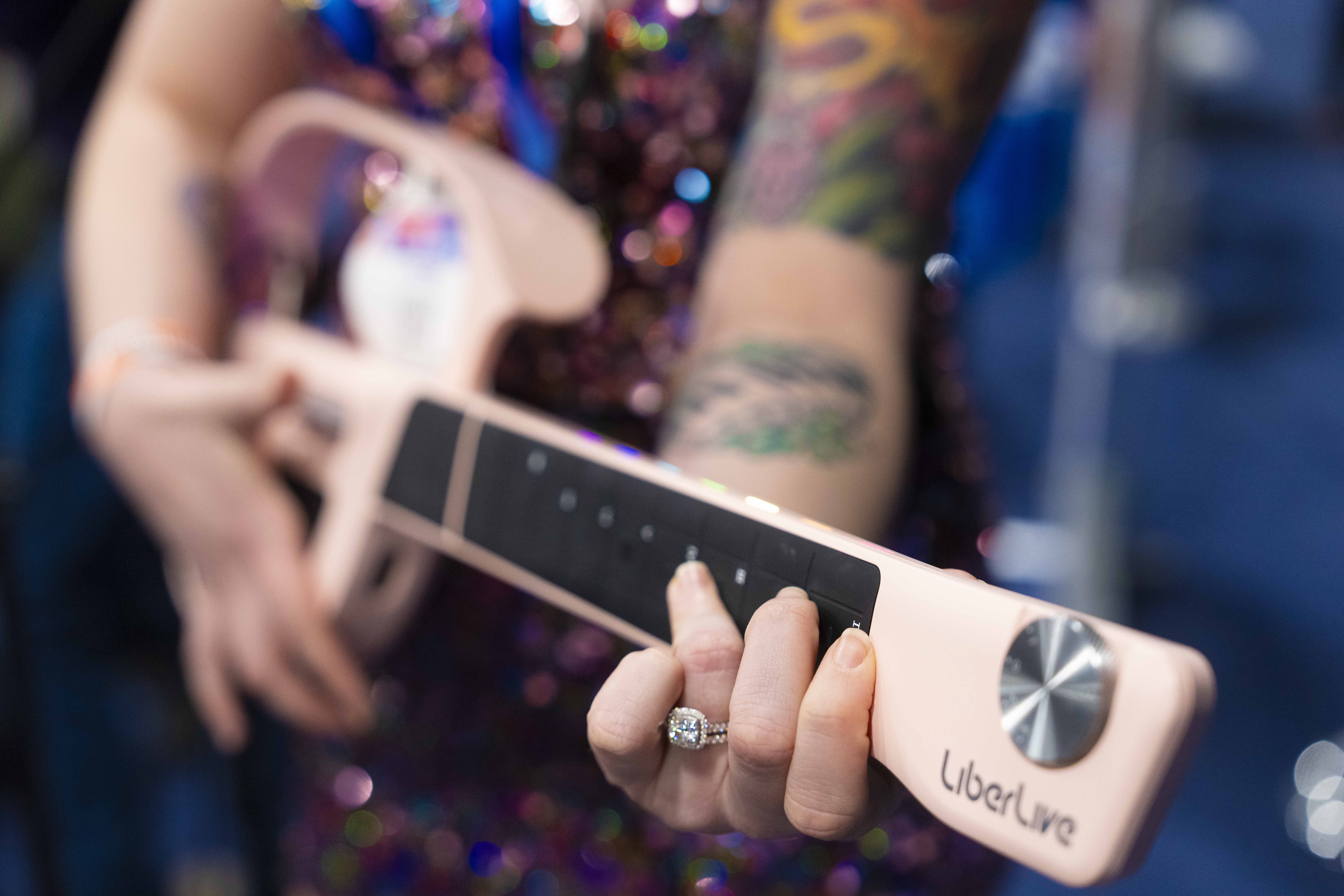 LiberLive showcases their stringless guitar at 2025 CES Unveiled, Sunday, Jan. 5, 2025, in Las Vegas.<br />(Jack Dempsey / AP Photo)