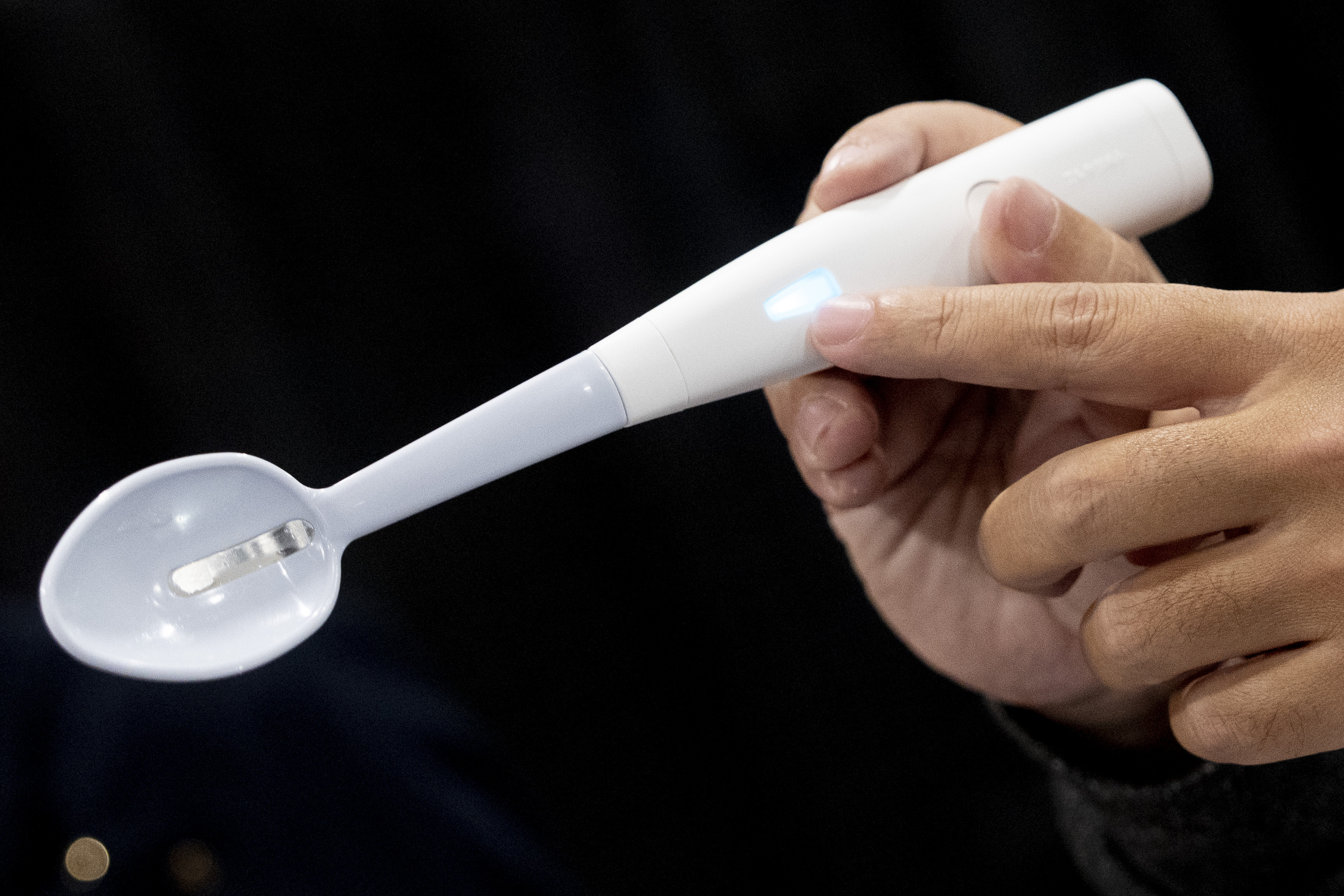 The Kirin Electric Salt spoon flows a mild electric current through the food around the tongue to attract salt towards the tongue creating a more intense salt flavor, during 2025 CES Unveiled, Sunday, Jan. 5, 2025, in Las Vegas.<br />(Jack Dempsey / AP Photo)