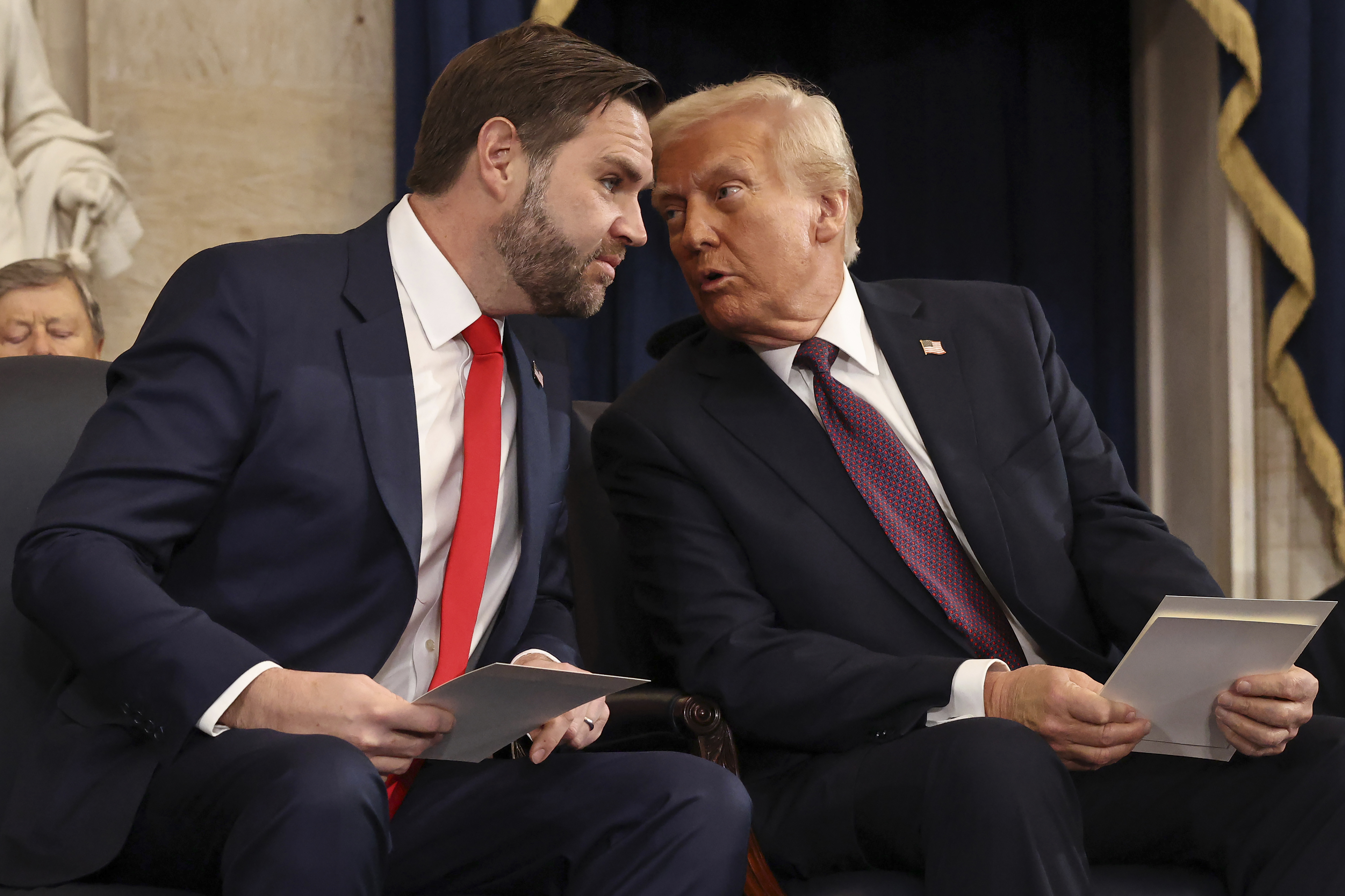 Vice President and former Sen. J.D. Vance, R-Ohio (left) and President Donald Trump speak during the 60th Presidential Inauguration in the Rotunda of the U.S. Capitol in Washington, Monday, Jan. 20, 2025.<br />(Chip Somodevilla / AP Photo)