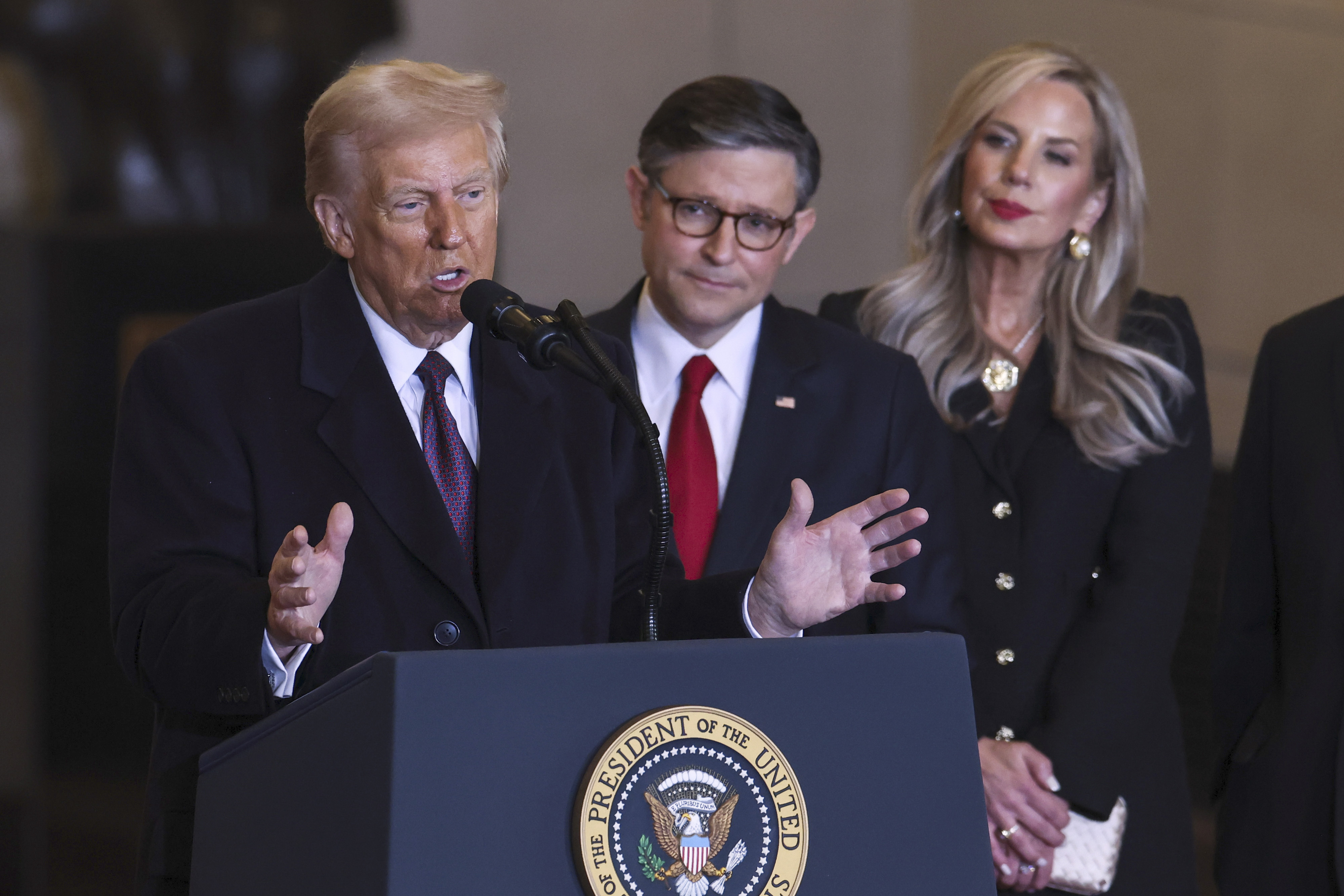 From left: President Donald Trump, House Speaker Mike Johnson and his wife Kelly Johnson listen after the 60th Presidential Inauguration, Monday, Jan. 20, 2025 in the U.S. Capitol in Washington.<br />(Graeme Jennings / Pool Photo via AP)