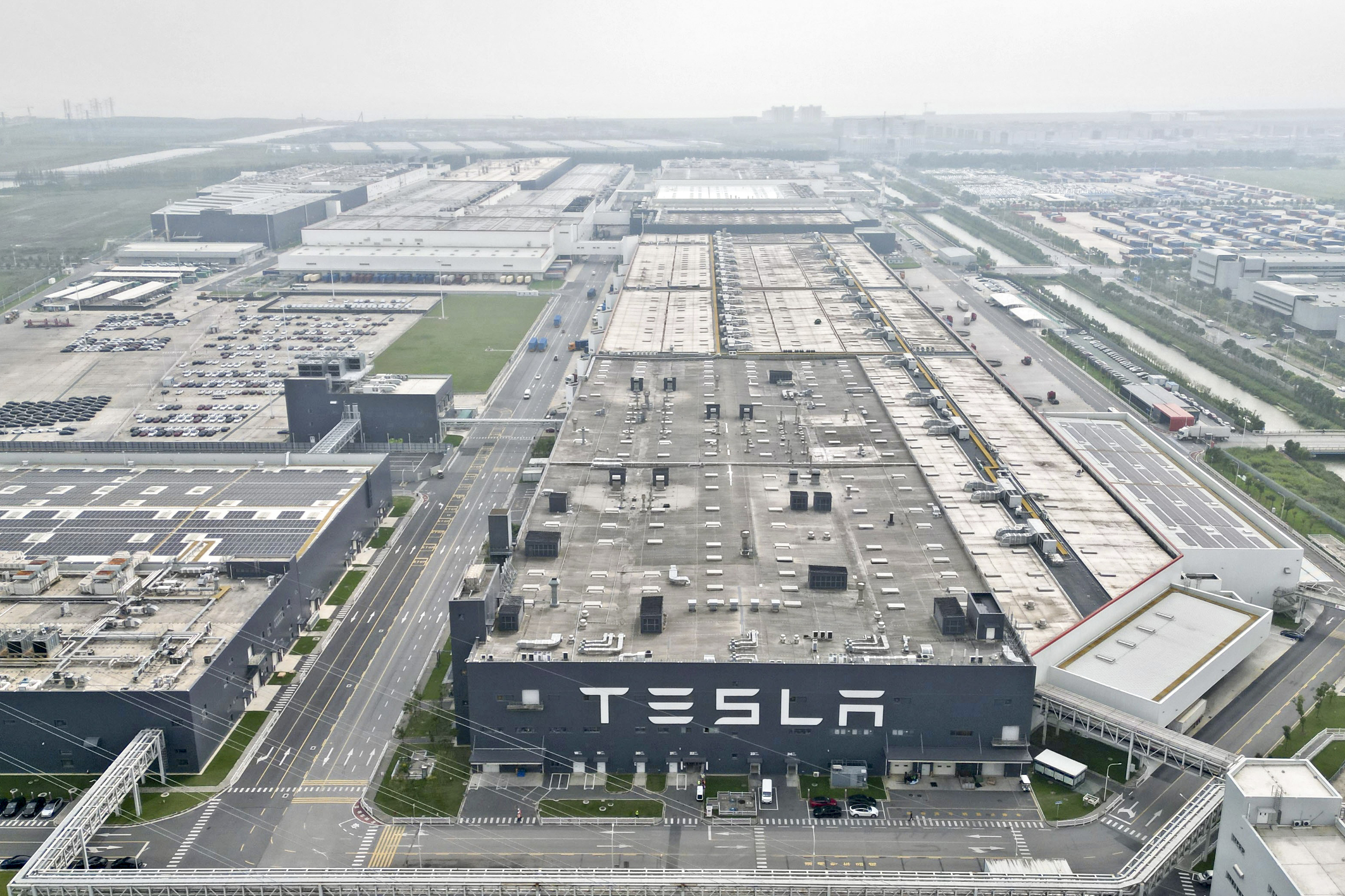 In this photo released by Xinhua News Agency, the Tesla Gigafactory in Lingang new area of the China (Shanghai) Pilot Free Trade Zone is seen in east China&#039;s Shanghai on Sept. 26, 2023.<br />(Liu Ying / Xinhua via AP)