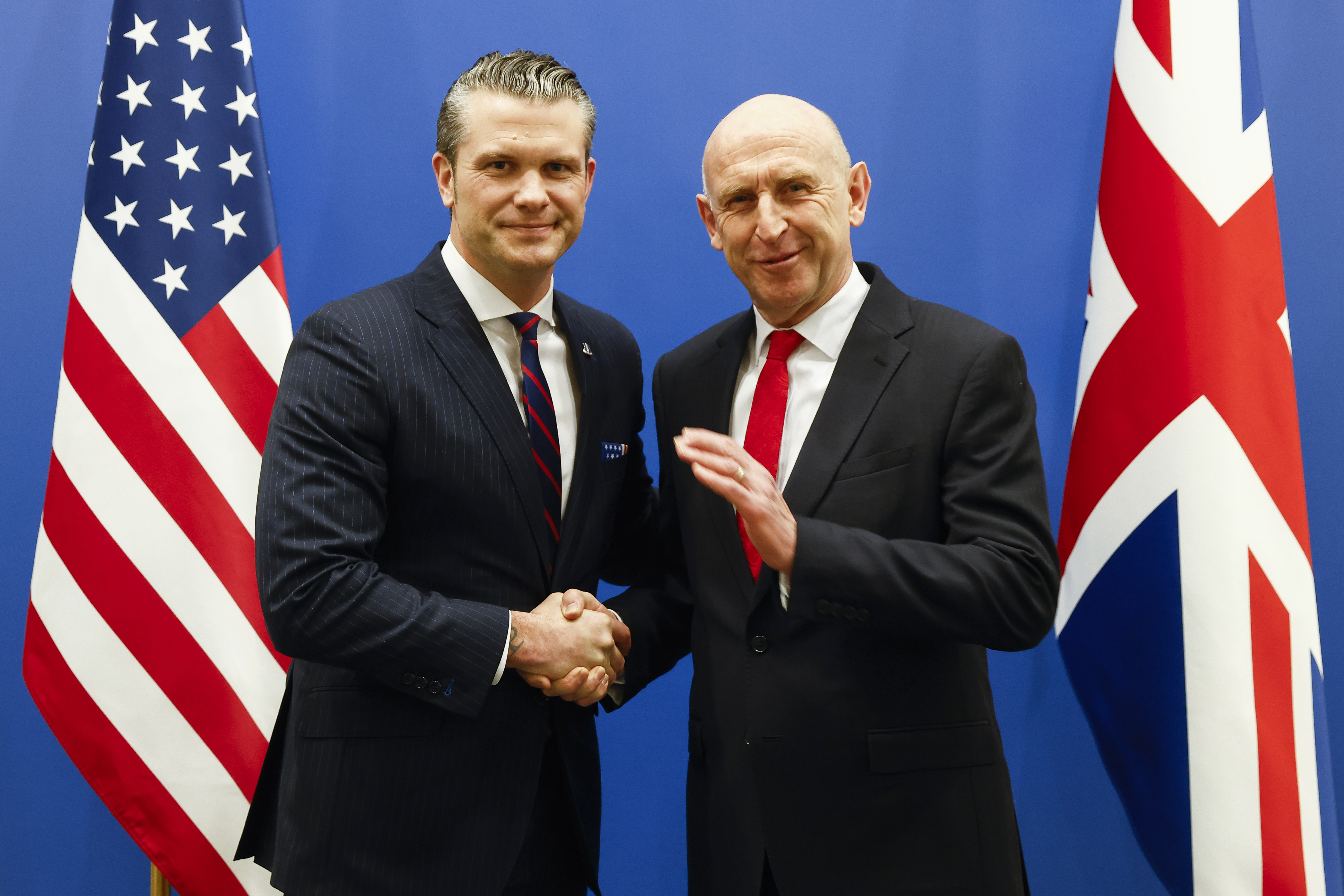 United States Secretary of Defense Pete Hegseth (left) shakes hands with Britain&#039;s Defense Secretary John Healey prior to a bilateral meeting on the sidelines of a NATO defense ministers meeting at NATO headquarters in Brussels, Wednesday, Feb. 12, 2025.<br />(Johanna Geron / AP Photo)