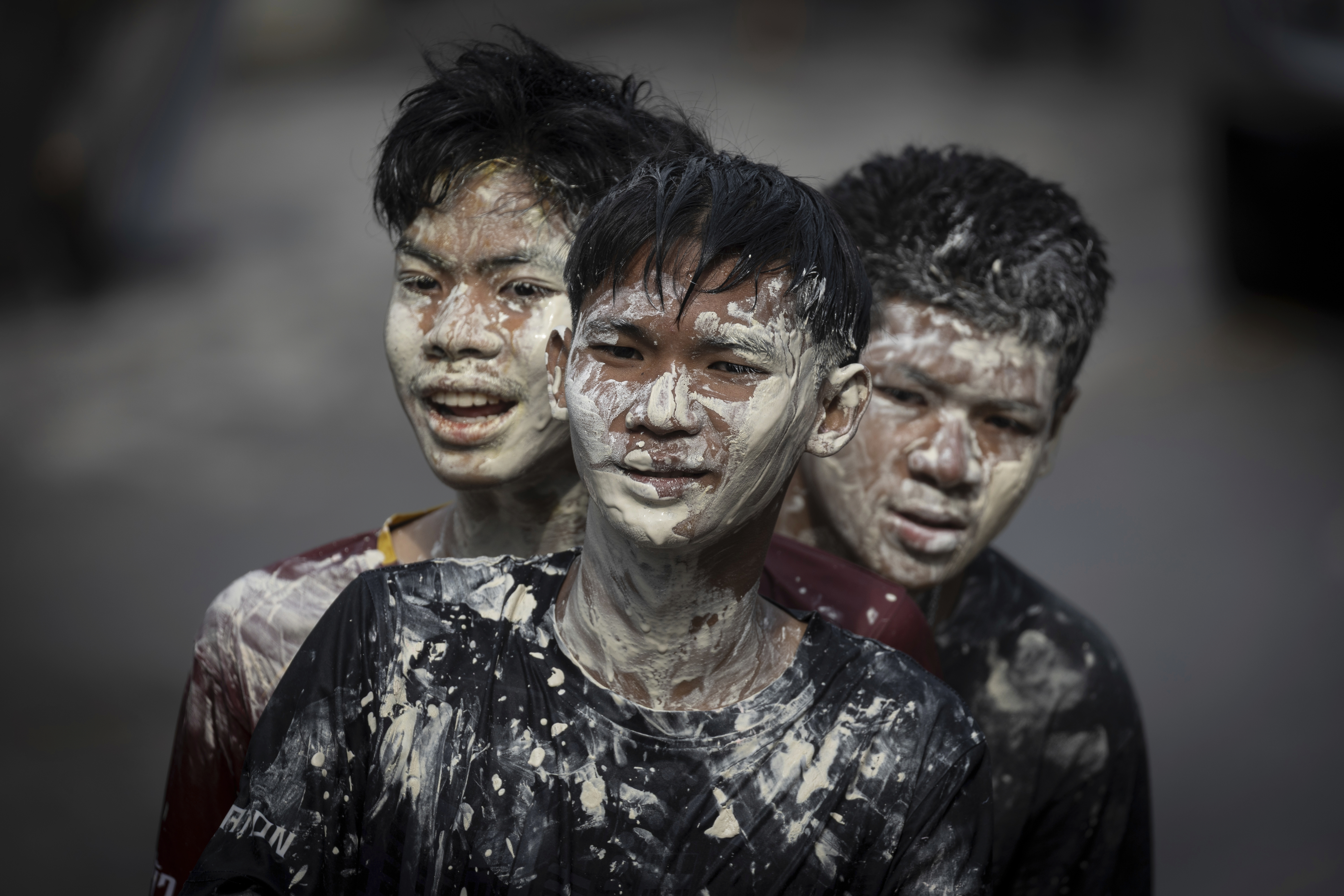 Thai people with faces stained with paint take part in the Songkran water festival to celebrate the Thai New Year in Prachinburi Province, Thailand, Sunday, April 13, 2025.<br />(Wason Wanichakorn / AP Photo)