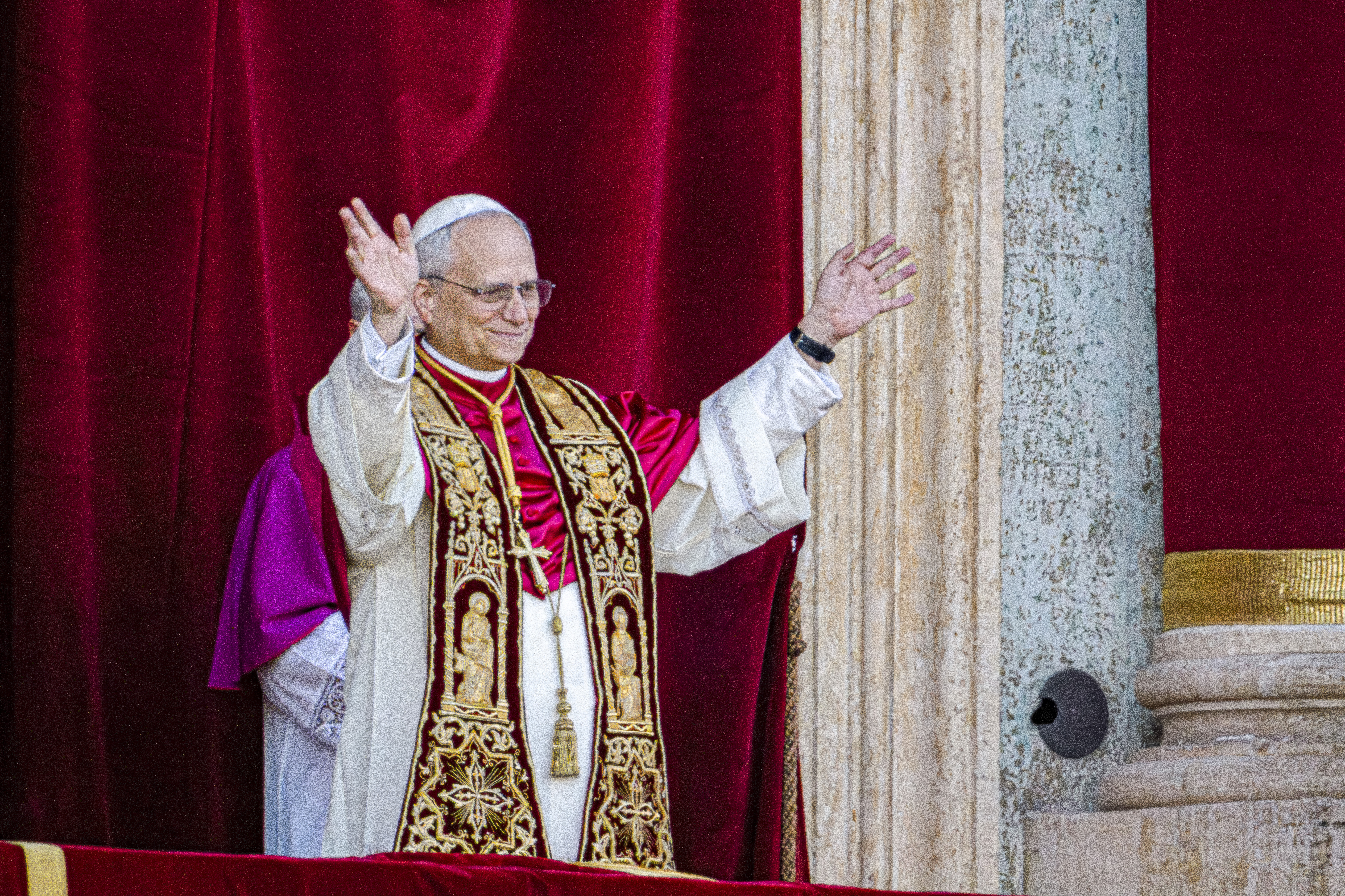 Newly elected Pope Leo XIV, formerly Cardinal Robert Francis Prevost, appears on the central loggia of St. Peter&#039;s Basilica at the Vatican shortly after his election as the 267th pontiff of the Roman Catholic Church, Thursday, May 8, 2025.<br />(Domenico Stinellis / AP Photo)