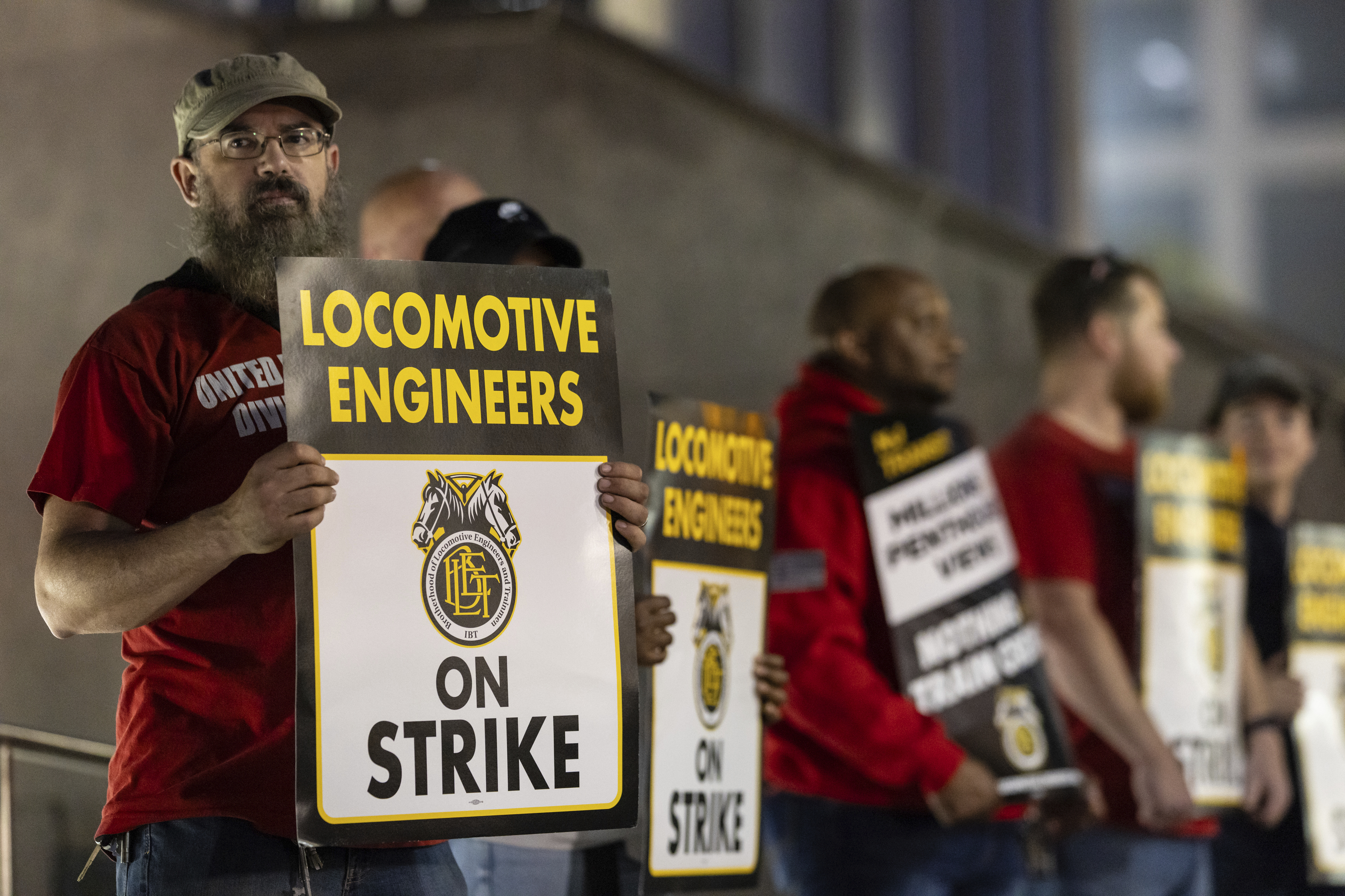 Union members from the Brotherhood of Locomotive Engineers and Trainmen form a picket line outside the NJ Transit Headquarters on Friday, May 16, 2025 in Newark, New Jersey.<br />(Stefan Jeremiah / AP Photo)
