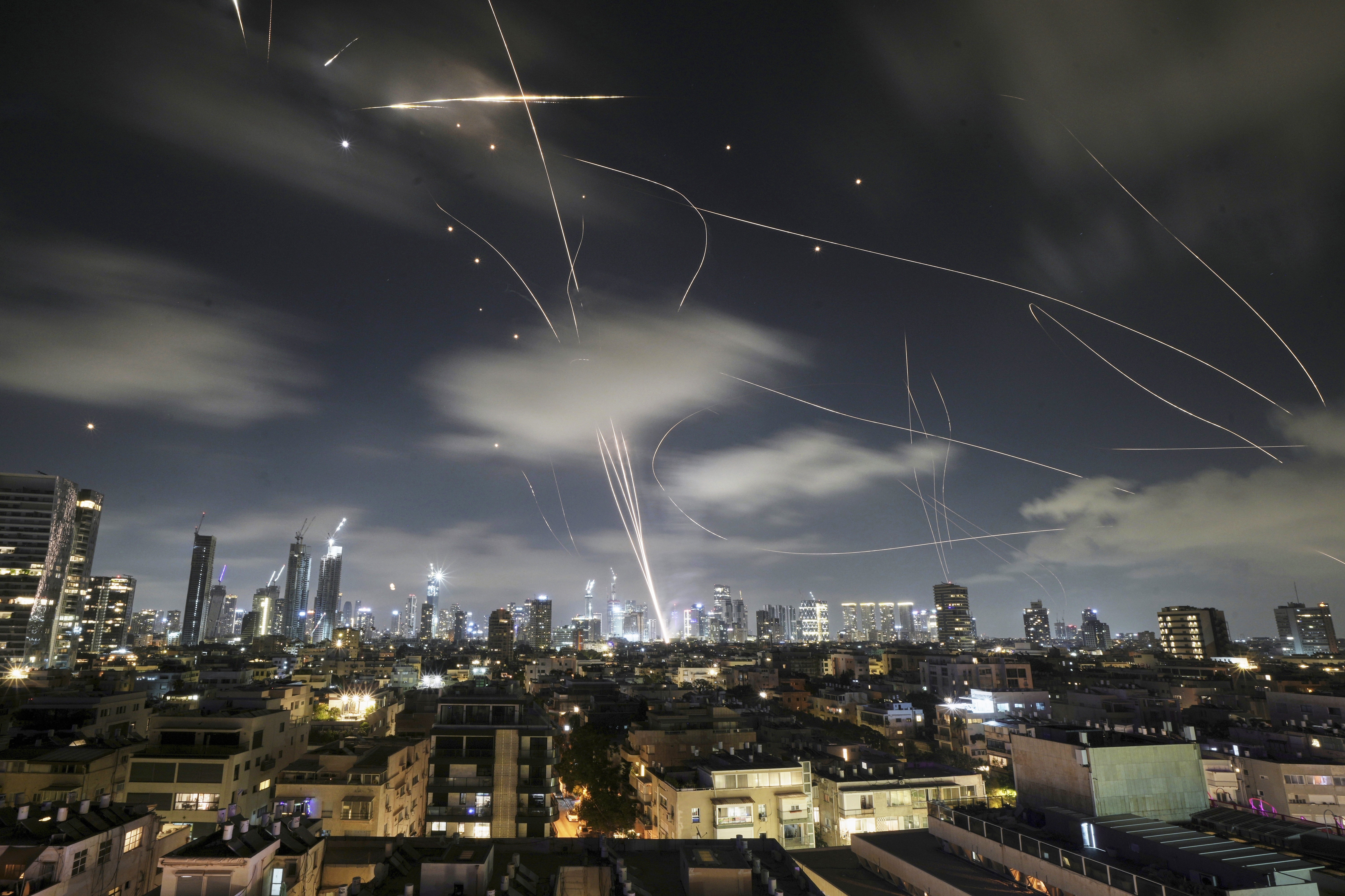 The Israeli Iron Dome air defense system fires to intercept missiles during an Iranian attack over Tel Aviv, Israel, early Wednesday, June 18, 2025.<br />(Leo Correa / AP Photo)