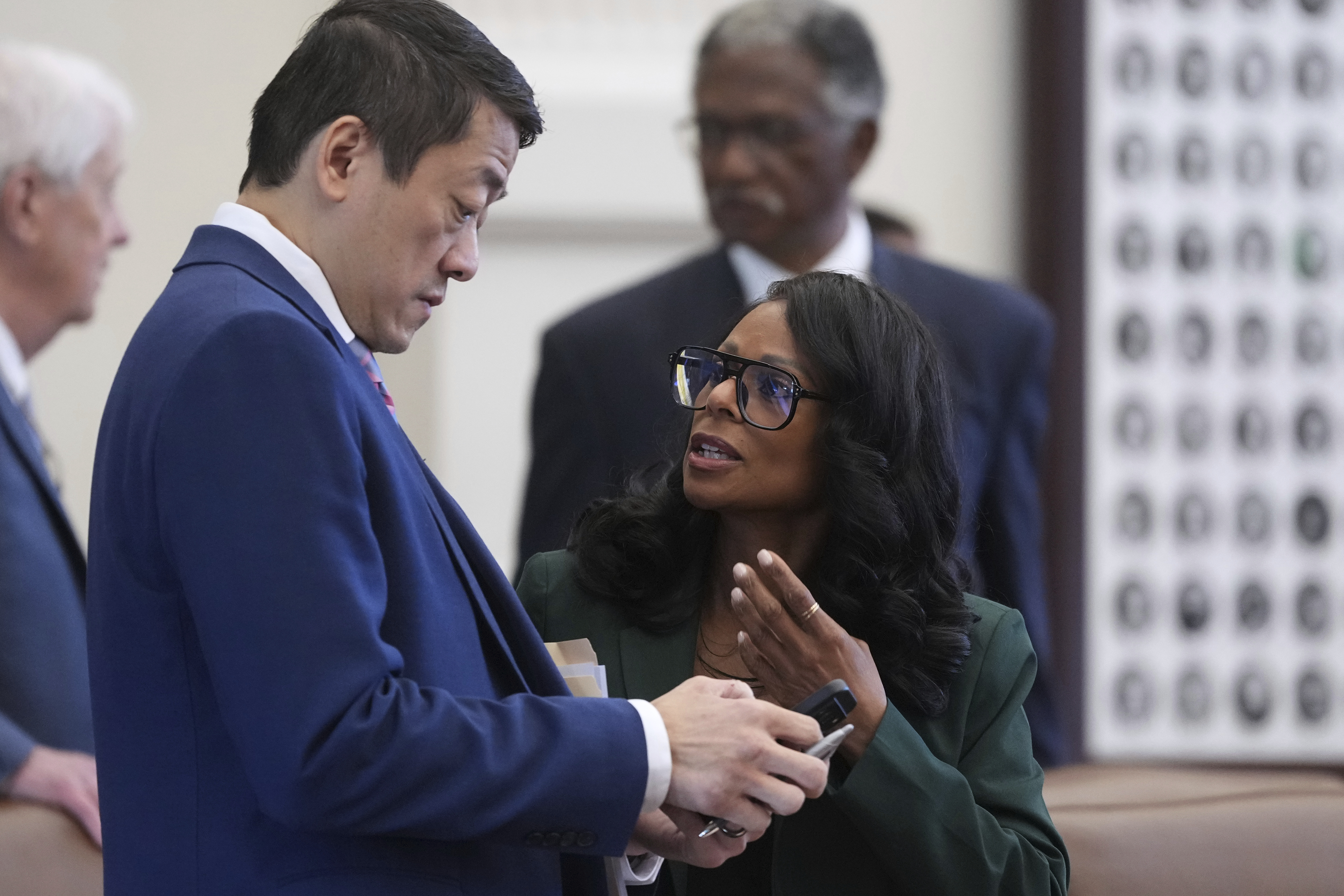 Democratic lawmakers Texas Rep. Gene Wu (left) and Rep. Nicole Collier (right) talk before a debate on a redrawn U.S. congressional map in Texas during a special, Wednesday, Aug. 20, 2025, in Austin, Texas.<br />(Eric Gay / AP Photo)