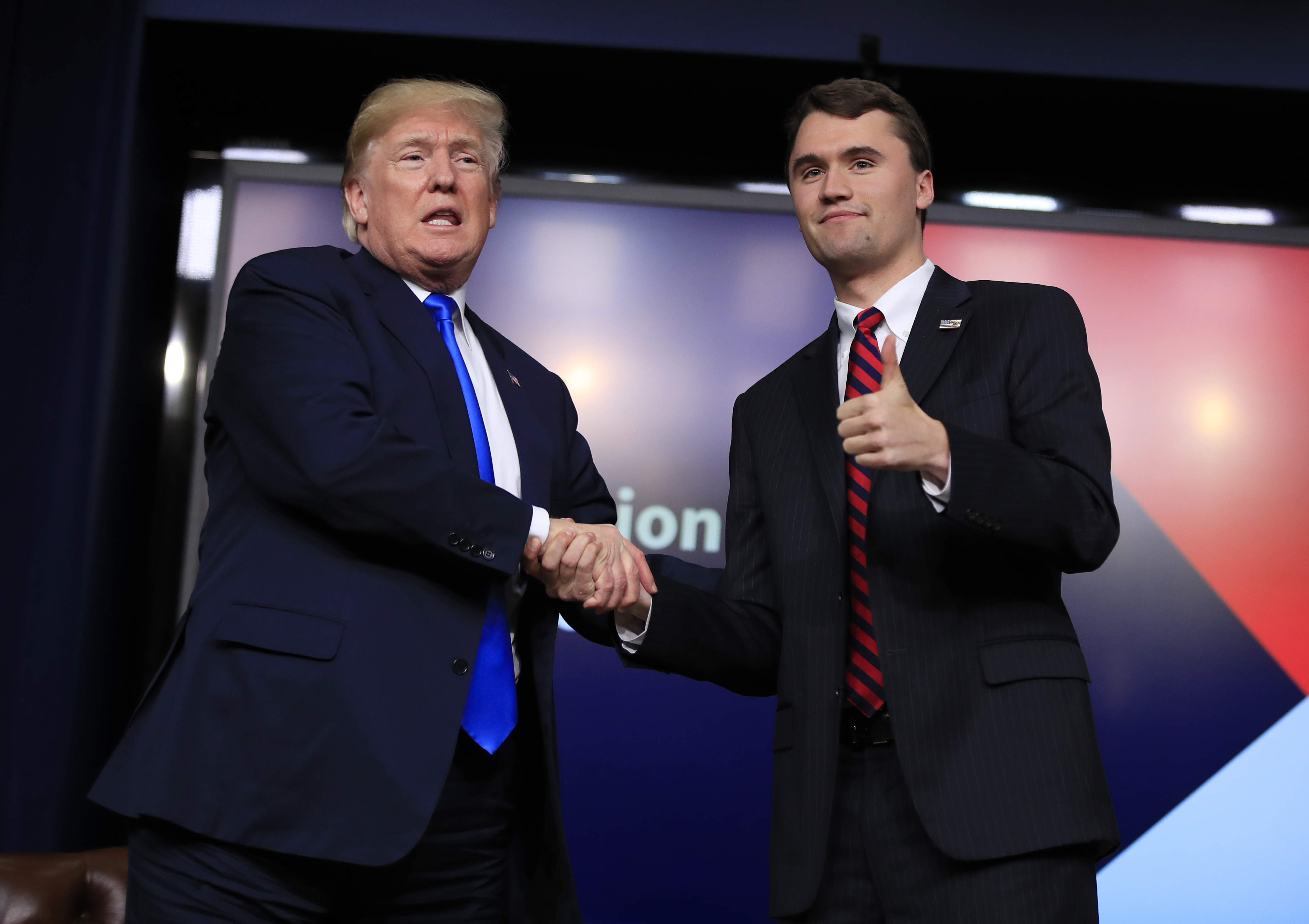 President Donald Trump shakes hands with moderator Charlie Kirk, during a Generation Next White House forum at the Eisenhower Executive Office Building on the White House complex in Washington, Thursday, March 22, 2018.<br />(Manuel Balce Ceneta / AP Photo)