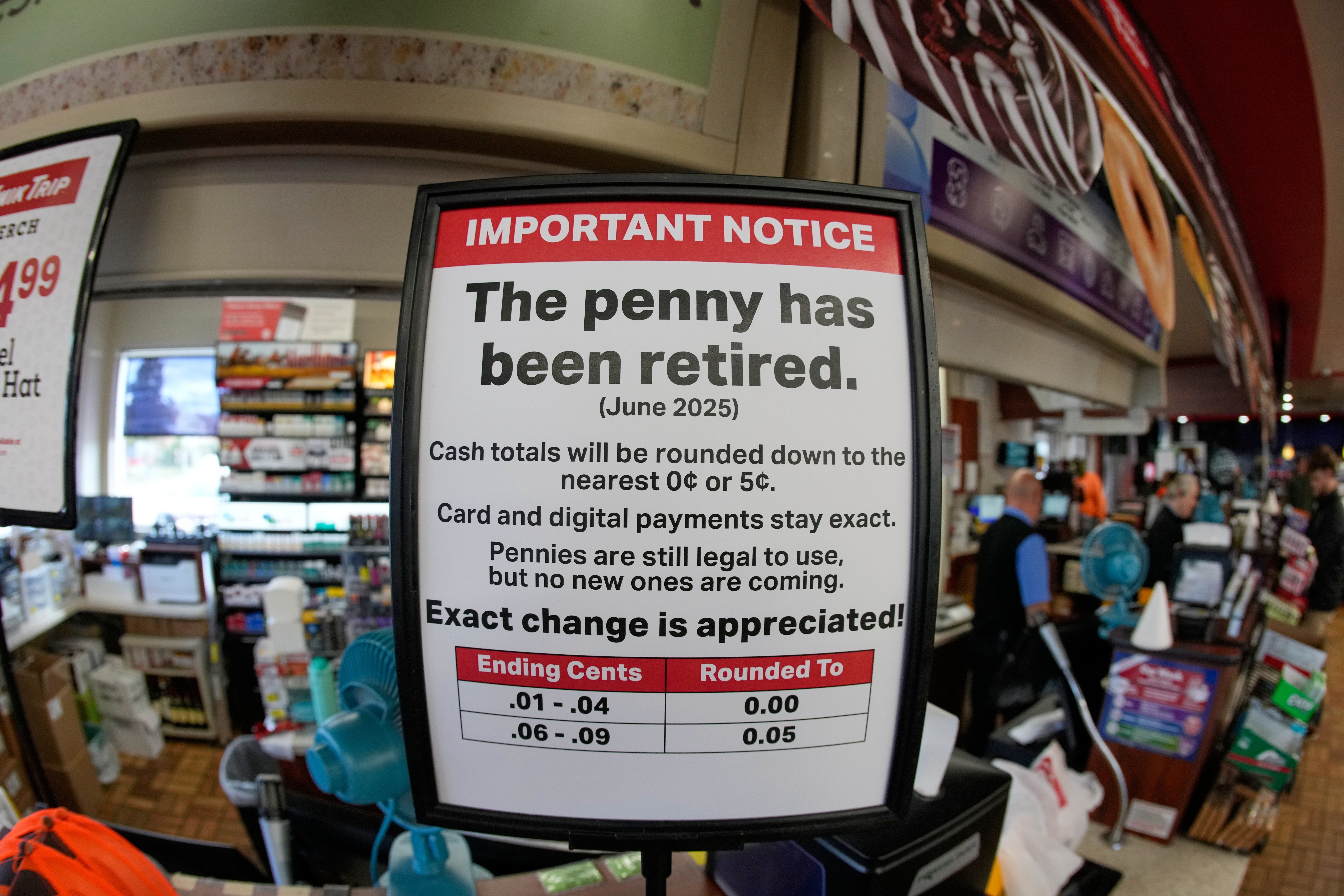 A sign in a Kwik Trip store shows the store will no longer be using pennies to give change, on Oct. 23, 2025, in Yorkville, Wis.<br />(Morry Gash / AP Photo)