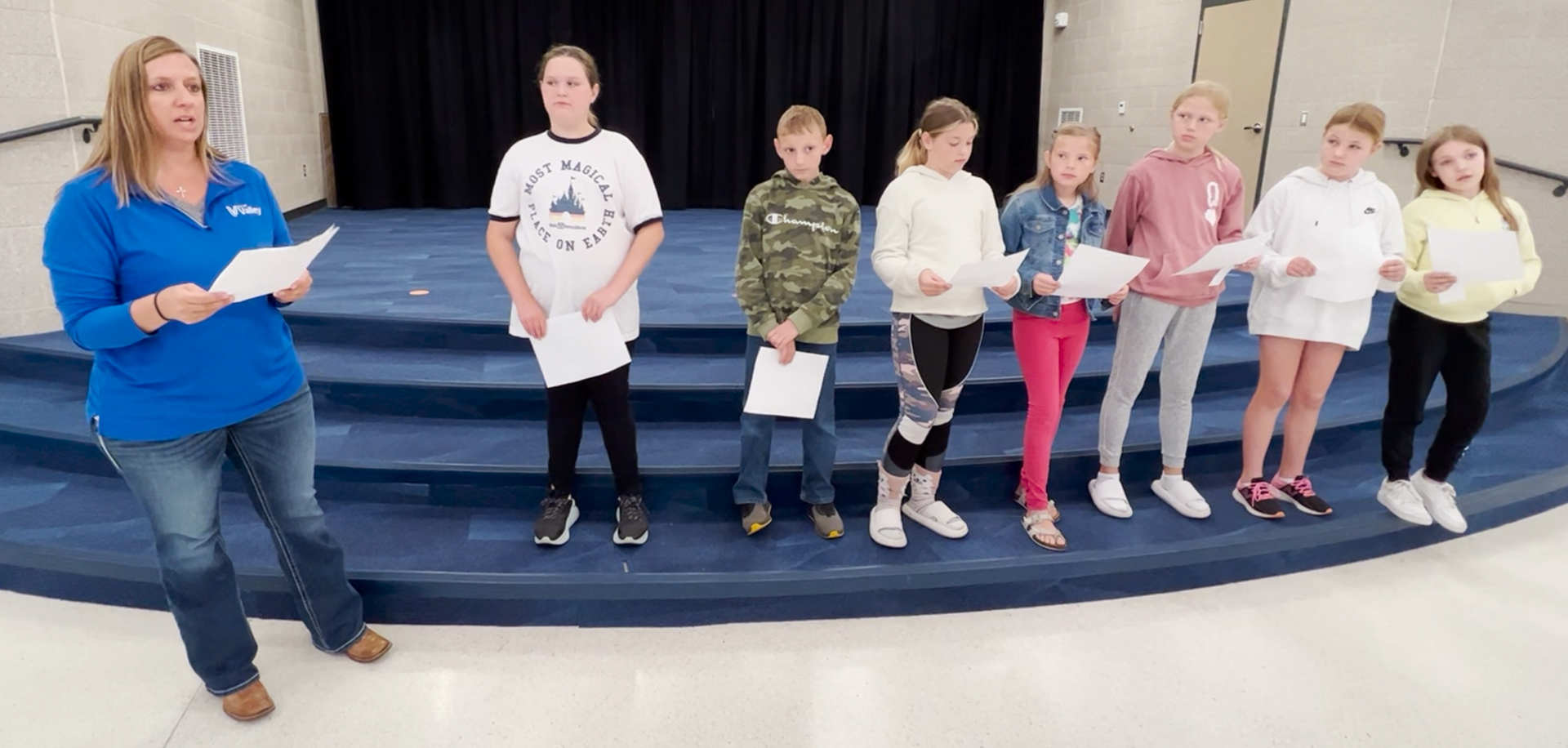 Valley Mayor Cindy Grove delivers an Arbor Day proclamation with the help of DC West Community Schools students during an assembly  on Friday, April 28, 2023.