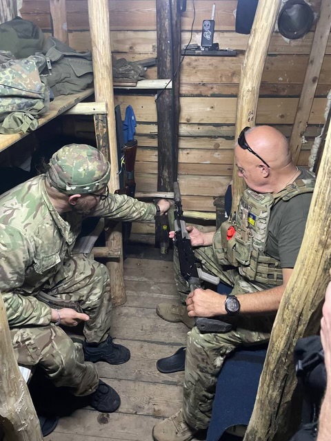 Brewer, at right, spent 36 years in the military. The new “drone war” in Ukraine means soldiers must hunker down in trenches until bad weather grounds the drones and allows them to attack.<br />(Courtesy of Noah Philson)
