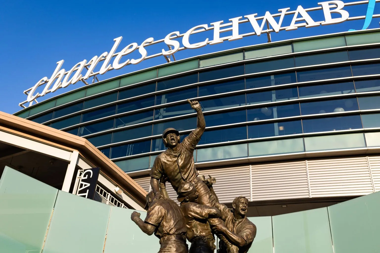 John Lajba’s Road to Omaha sculpture stands outside Charles Schwab Field in downtown Omaha days ahead of the start of the 2024 College World Series. Omaha was among a handful of cities seeking to land the College Baseball Hall of Fame. Ultimately, a nonprofit spearheading the effort chose Overland Park, Kansas.<br />(Joseph Saaid / Flatwater Free Press)