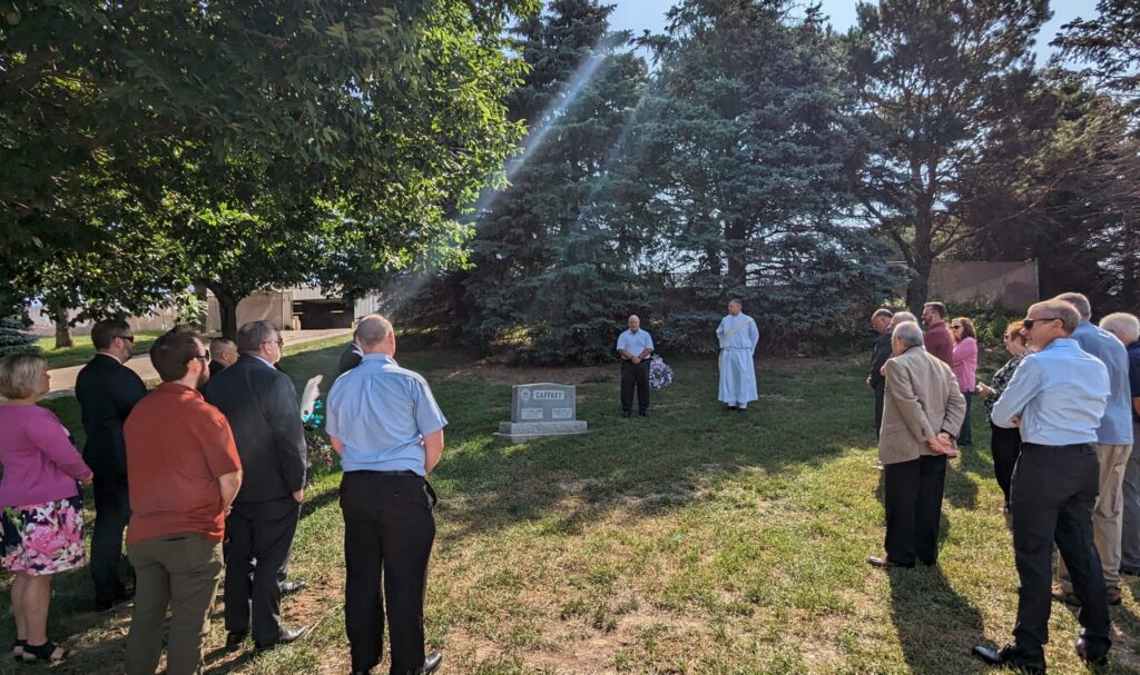 A group of current and former FBI agents laid a wreath Tuesday at the grave of a fellow agent gunned down in the Kansas City Massacre 90 years ago. (Courtesy of the Omaha Office of the FBI)