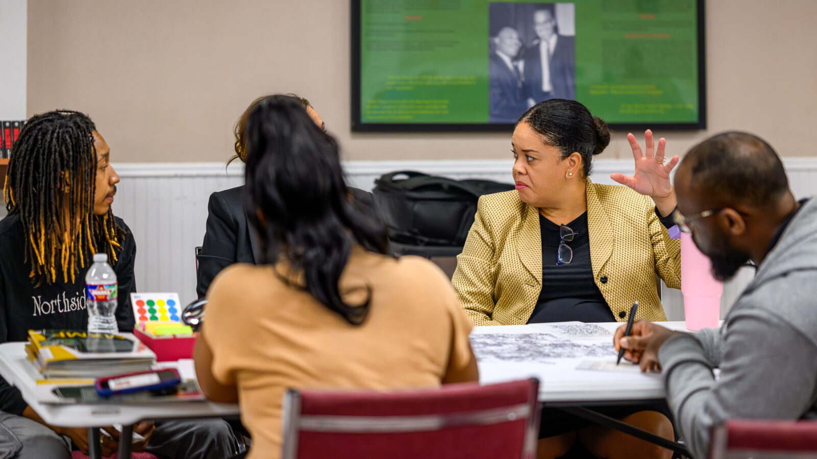 Community meetings were held earlier this month to gather input for the redevelopment of the Malcolm X Cultural Center campus in North Omaha. Here, Omaha City Councilwoman LaVonya Goodwin joins in a table discussion.<br />(Courtesy of Loud Nerd)