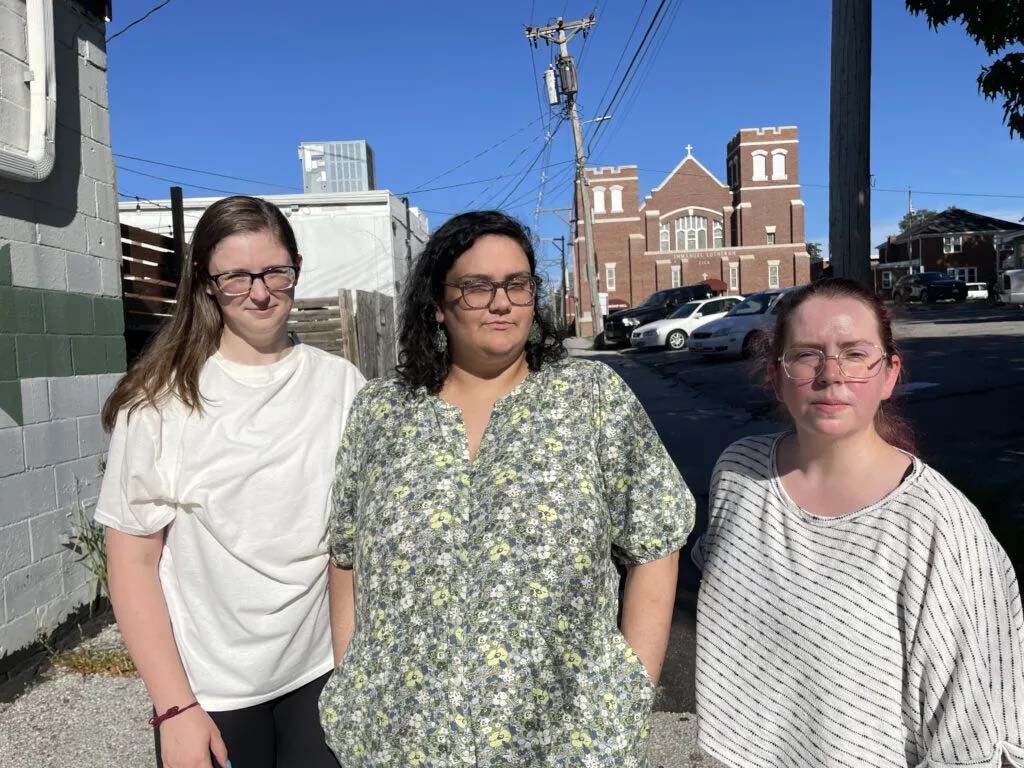Former Douglas County Historical Society employees (from left) Dana Broer, Andria Thompson and Meg McCrina pose for a photo.<br />(Jeremy Turley / Flatwater Free Press)