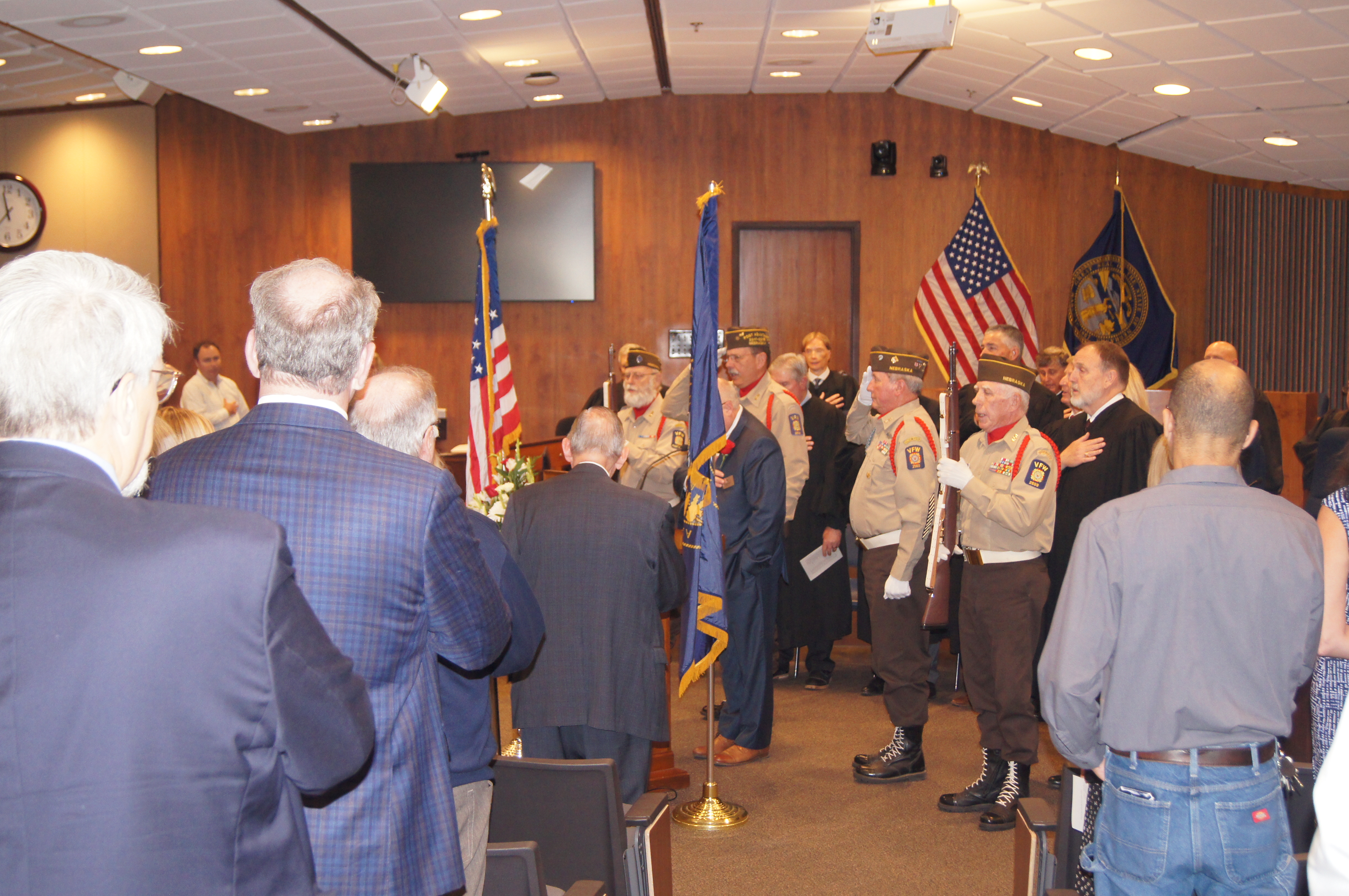 An honor  guard member leads in the forefront.  The Pledge of Allegiance was said at a poignant moment.<br />(Don Rashid / The Daily Record)