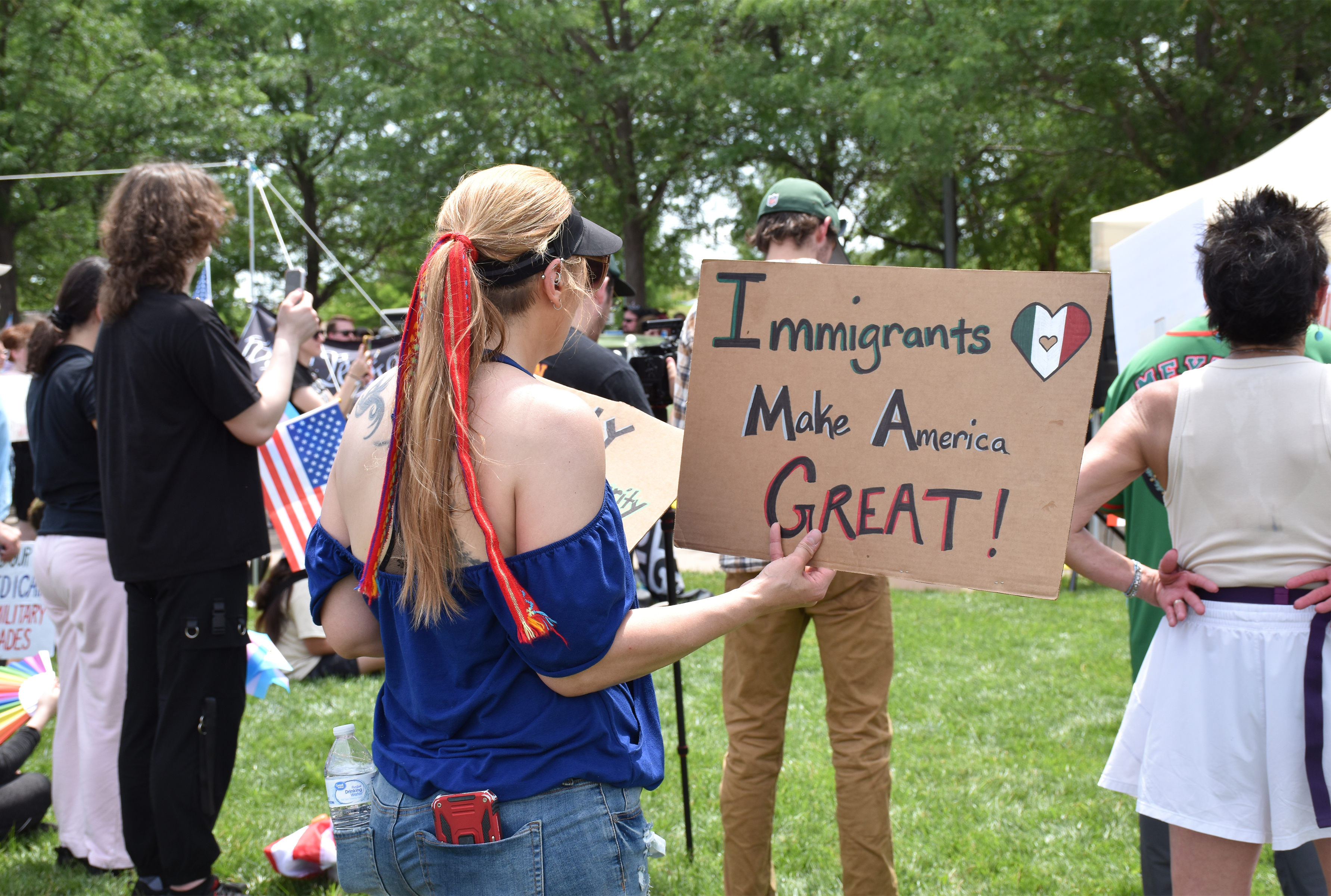 Nebraskas and Iowans protesting for immigrant rights at the “No Kings” rally on June 14, 2025 at Tom Hanafan River’s Edge Park.<br />(Carla Chance / The Daily Record)