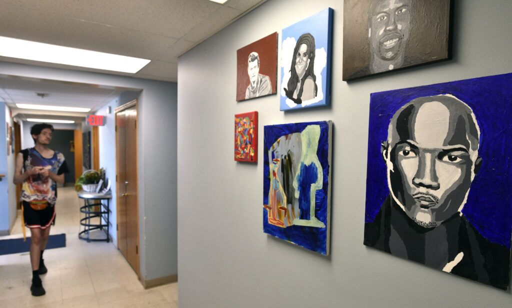 Art lines the walls at Live Yes Studios’ former location near Q Street and North Antelope Valley Parkway in Lincoln. In July, the nonprofit moved to a temporary space near M and 11th streets. Eventually, Live Yes will move into a renovated suite in the same building.<br />(Eric Gregory / Flatwater Free Press)