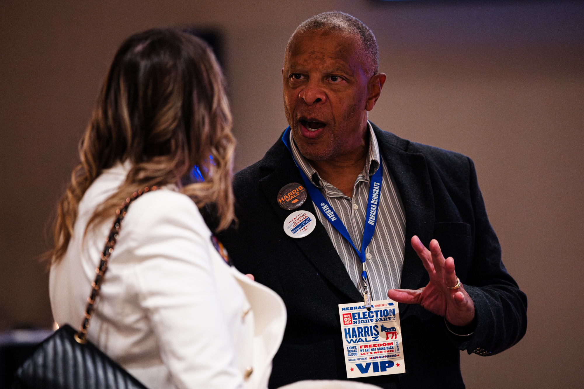 John Ewing, Douglas County treasurer and an Omaha mayoral candidate, speaks to a voter at the Nebraska Democrats’ watch party at the Hilton Omaha on Tuesday, Nov. 5, 2024.<br />(Mac Johnson / Nebraska News Service)
