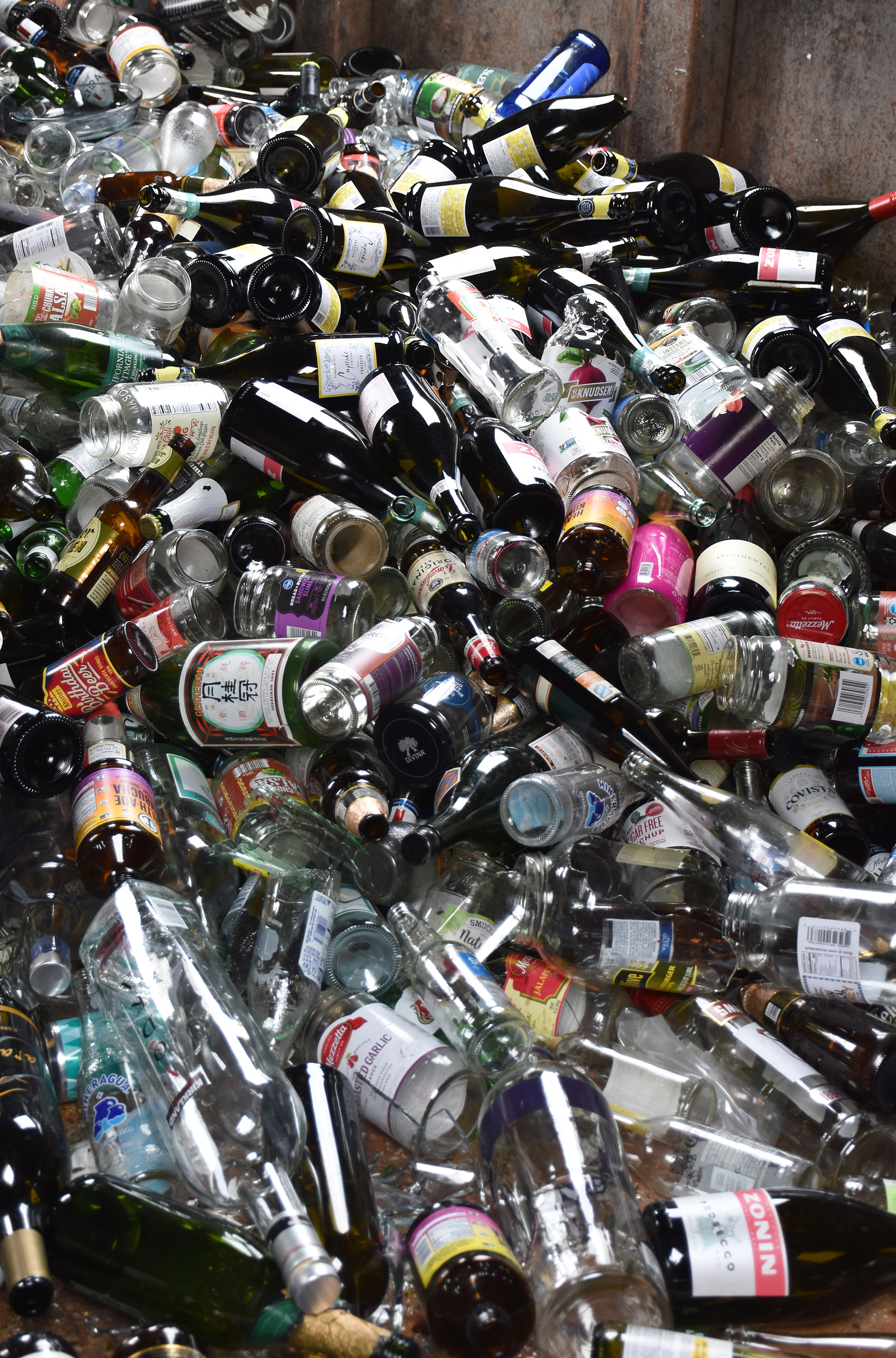 One might just see bottles in the recycling bins, others may see possibilities. Container glass is 100 recyclable, can be recycled endlessly, and is a primary ingredient in fiberglass insulation, new glass containers and has a multitude of other reuses.<br />(Carla Chance / The Daily Record)