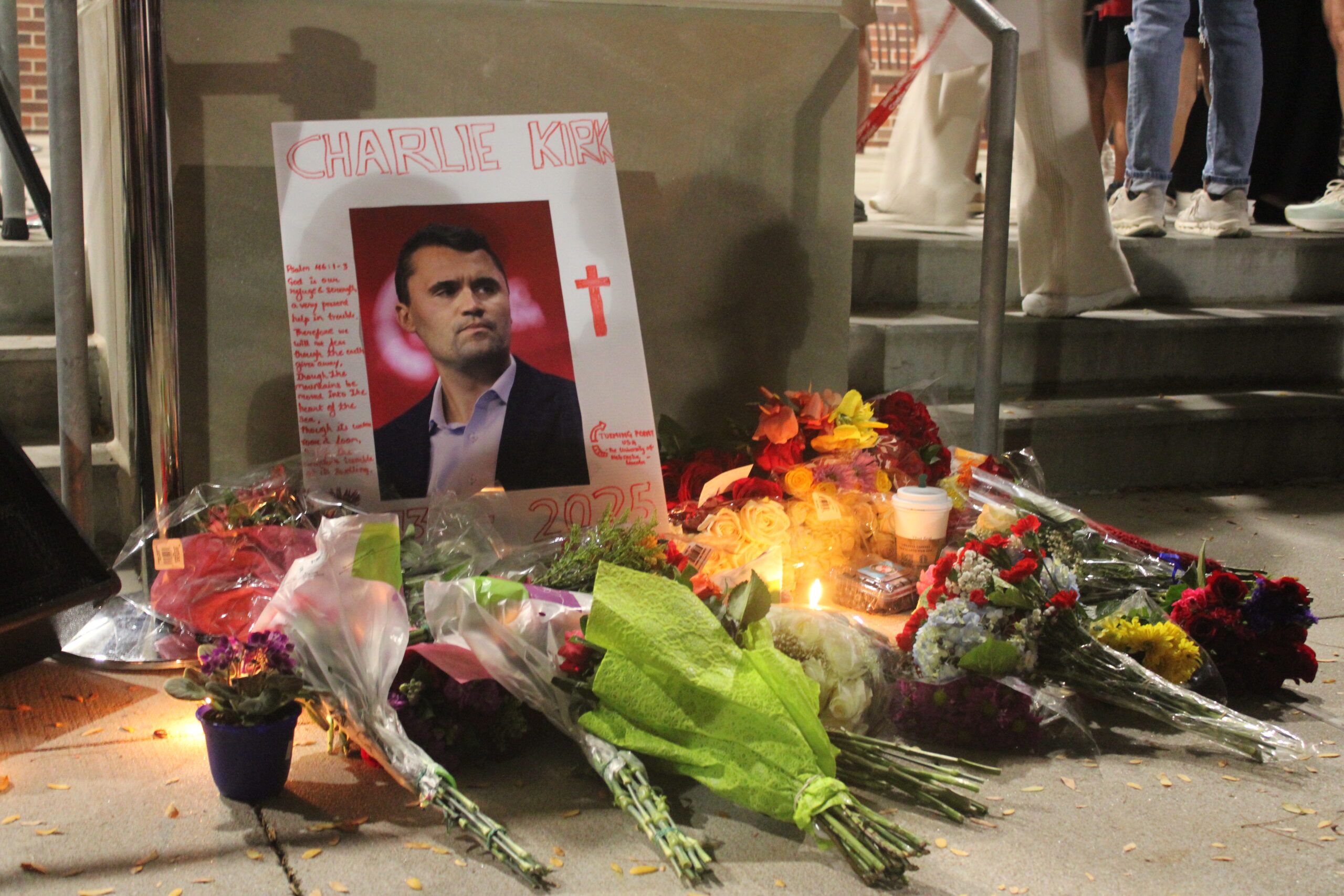 Flowers left for Chaire Kirk after a vigil at the University of Nebraska-Lincoln on Sept 17, 2025.<br />(Juan Salinas II / Nebraska Examiner)