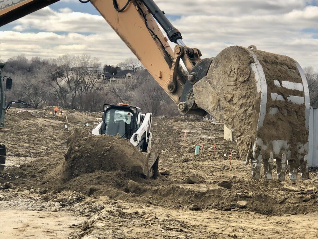 Construction crews prepare the 15-acre site in the Elkhorn area for the mixed-income Capriana neighborhood, which will switch things up: the affordable component will be the single-family homeownership options and the apartments will be market rate rentals.<br />(Cindy Gonzalez / Nebraska Examiner)