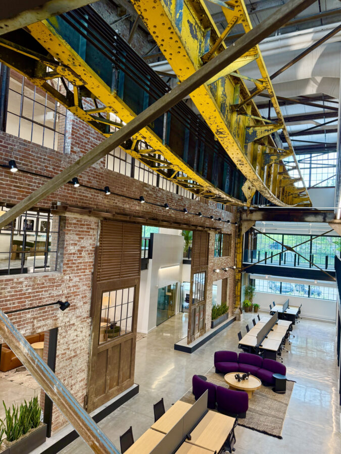 Shown up high is the gantry crane that used to move steel in the factory and now is part of the historic decor.<br />(Cindy Gonzalez / Nebraska Examiner)