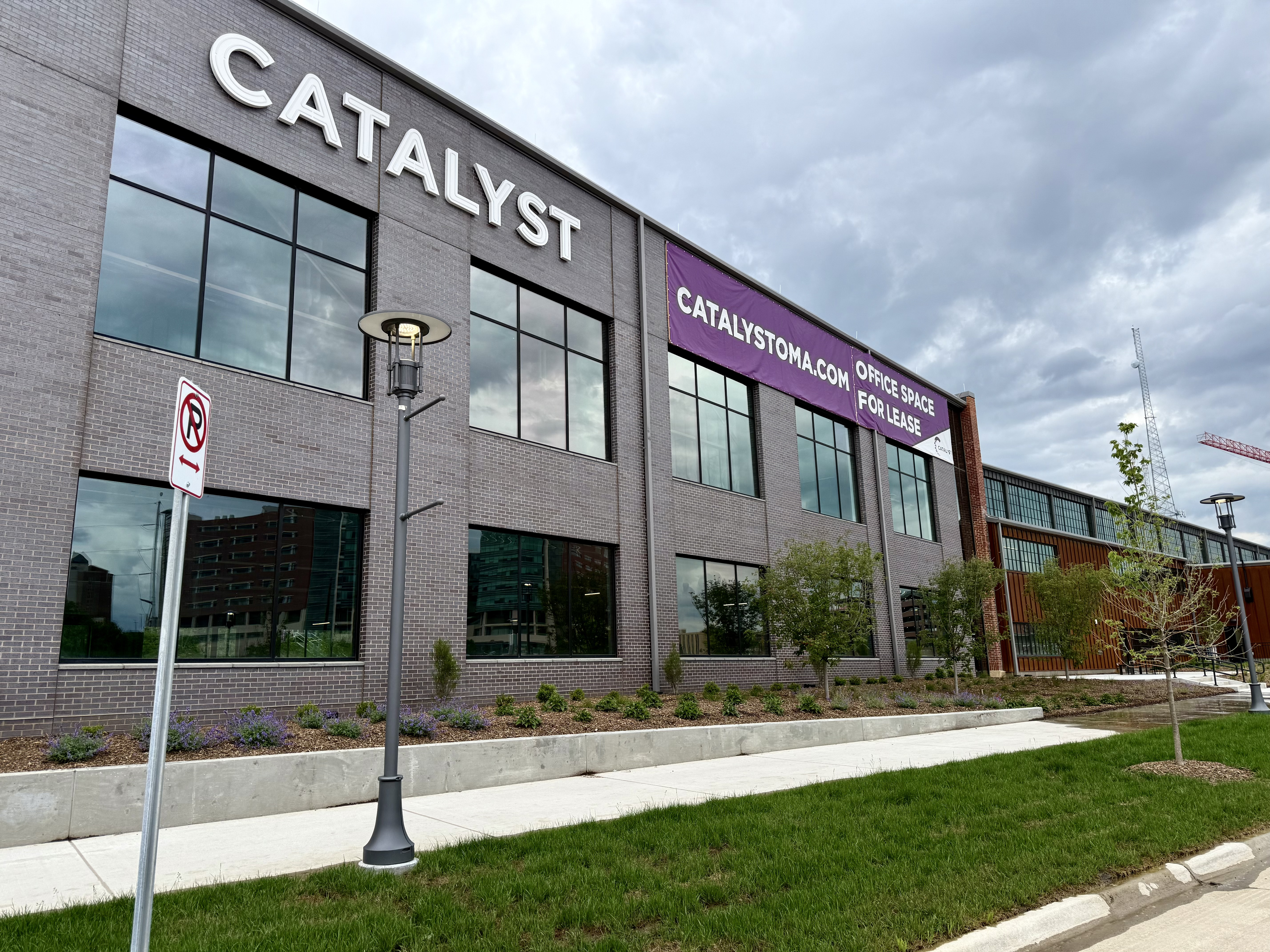 Outside the Catalyst, an adaptive reuse project led by private developers Omaha’s GreenSlate and Denver-base Koelbel and Co. in partnership with the University of Nebraska Medical Center.<br />(Cindy Gonzalez / Nebraska Examiner)