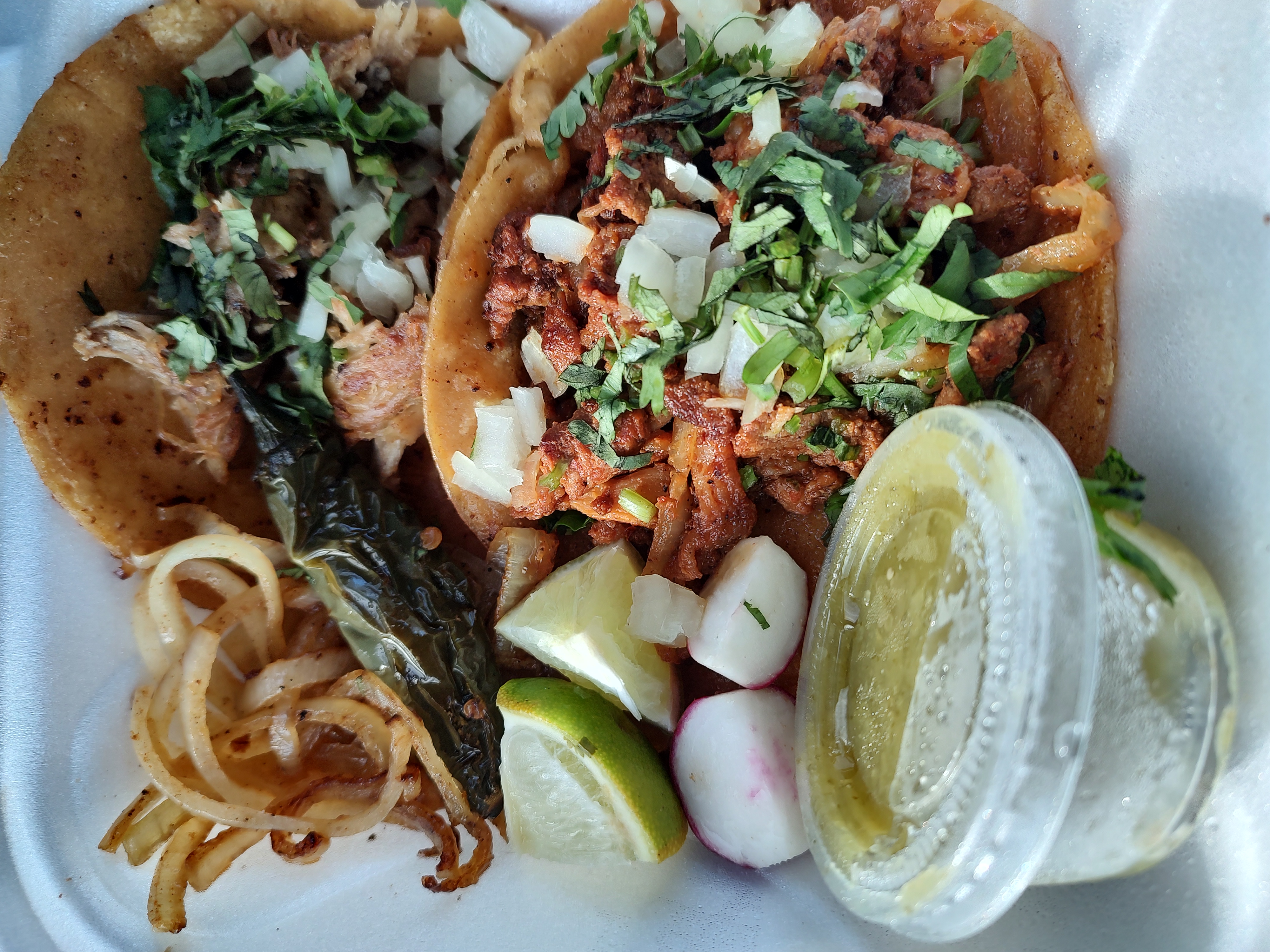 &quot;La Barca&quot; is an absolute sleeper of a taco truck. The best carnitas street tacos in town, and the only truck in this list that cooks its onions, mhmmm.<br />(Austin Petak / The Daily Record)