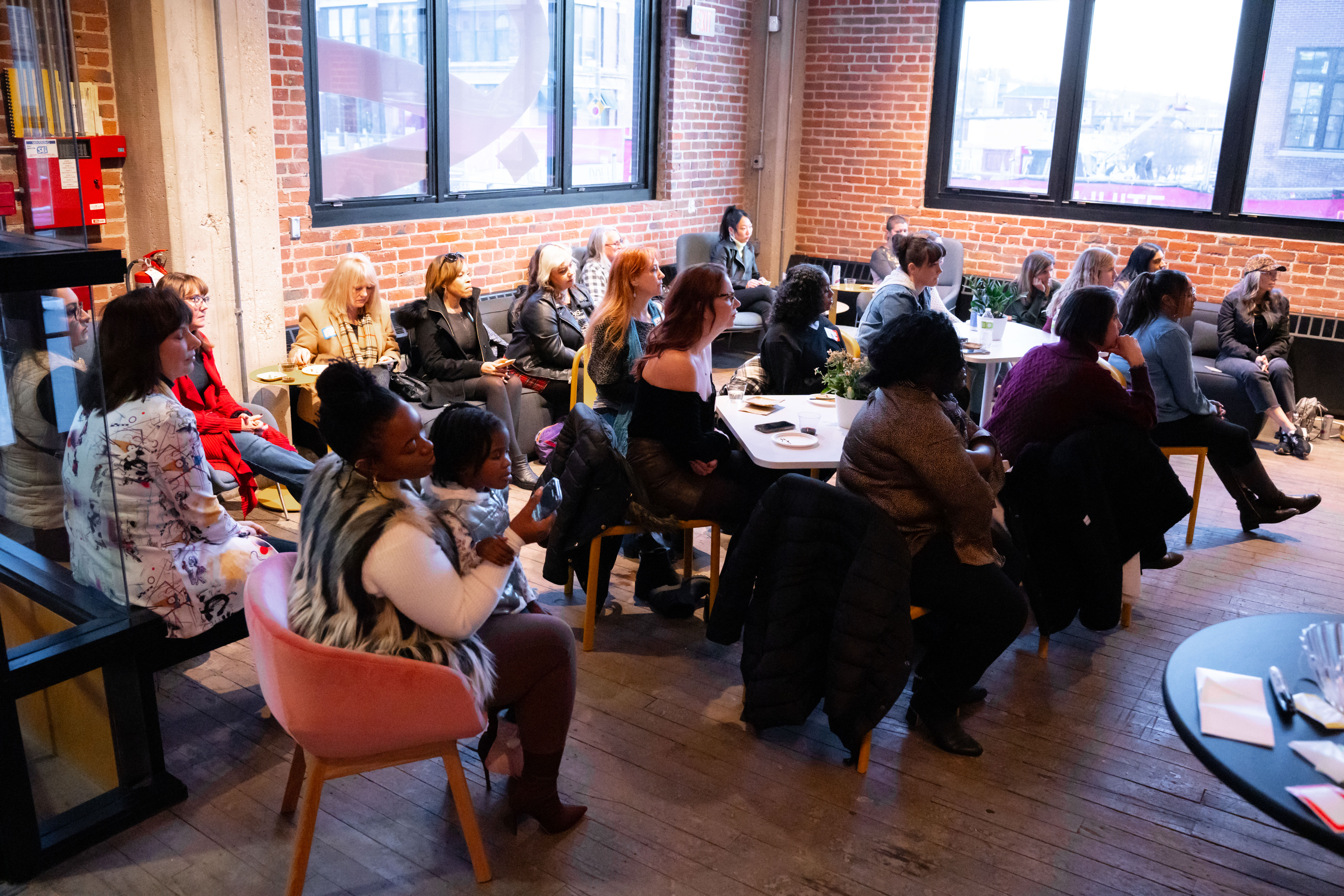Their professional networking events have the perfect way to help you inspire, influence, and learn from each other: in-person events. They start with a 1/2 happy hour networking, and follow up with 2 speakers. (Courtesy of Sandy Spady)