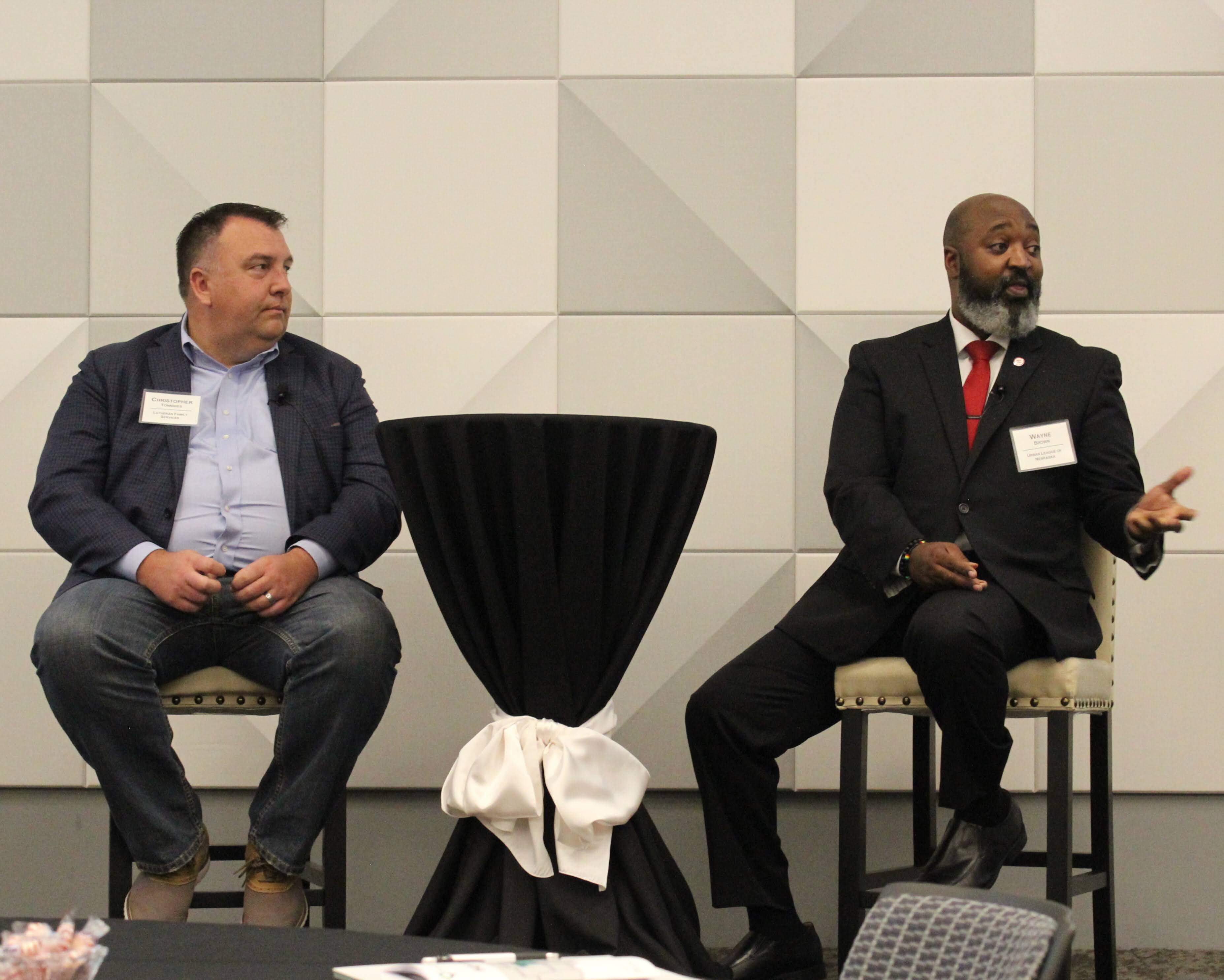 Chris Tonniges (left), President and CEO of Lutheran Family Services, and Wayne Brown, President and CEO of the Urban League of Nebraska talk at the inaugural Symposium designed to connect nonprofits with one another to create a collaborative environment.<br />(Courtesy of Lutheran Family Services)
