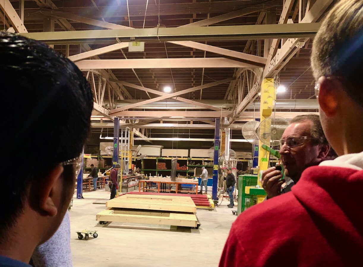 Students tour the Structural Component Systems facilities in Fremont, where Gov. Jim Pillen and other officials celebrated Manufacturing Month in Nebraska. ses that offer credits for high school as well as Metropolitan Community College.<br />(Cindy Gonzalez / Nebraska Examiner)
