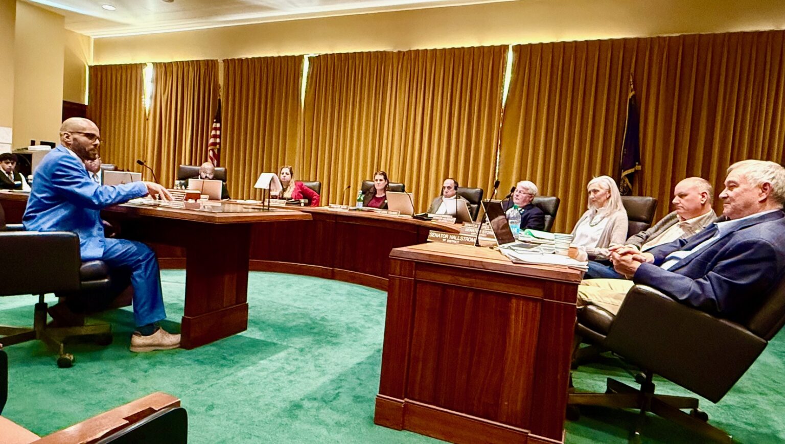 Jason Witmer, policy fellow at ACLU Nebraska, speaks to the Legislature’s Judiciary Committee on Friday about Legislative Bill 99, which, among other things, would restrict the consecutive days an inmate could be isolated in restrictive housing.<br />(Cindy Gonzalez / Nebraska Examiner)