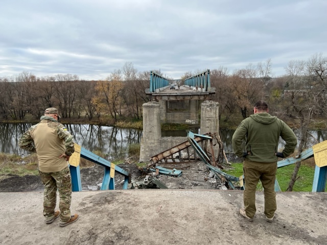State Sen. Tom Brewer observes the destruction of the Siverskyi Donets River bridge in Izyum, Ukraine.<br />(Courtesy of State Sen. Tom Brewer)
