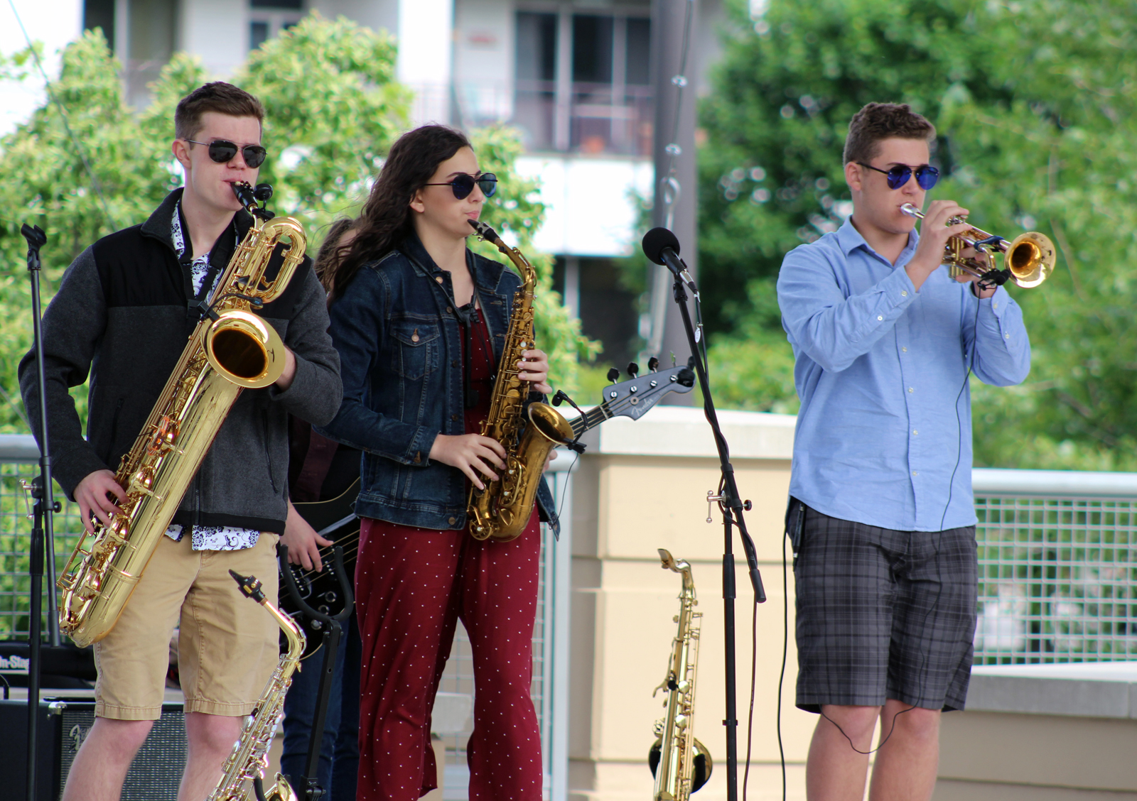 #3 The blues band Us and Them perform during Legal Aid of Nebraska’s Omaha Gives celebration in Midtown Crossing’s Turner Park on Wednesday, May 23, 2019. (Photo by Scott Stewart)