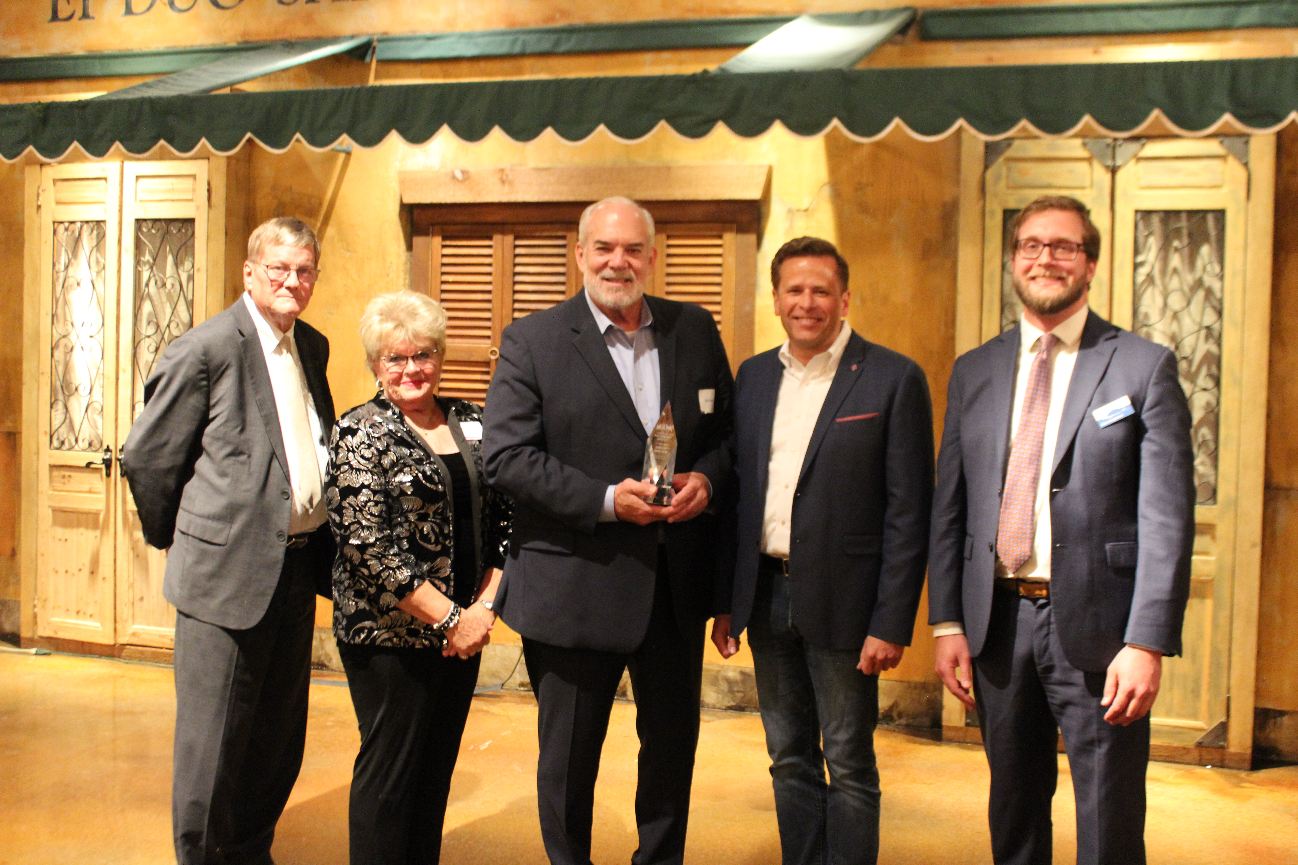 The Award of Merit is MAPA’s highest honor for service. David Brown (center) received the award for his tireless work to improve quality of life in the Greater Omaha region through economic development. (Courtesy of MAPA)