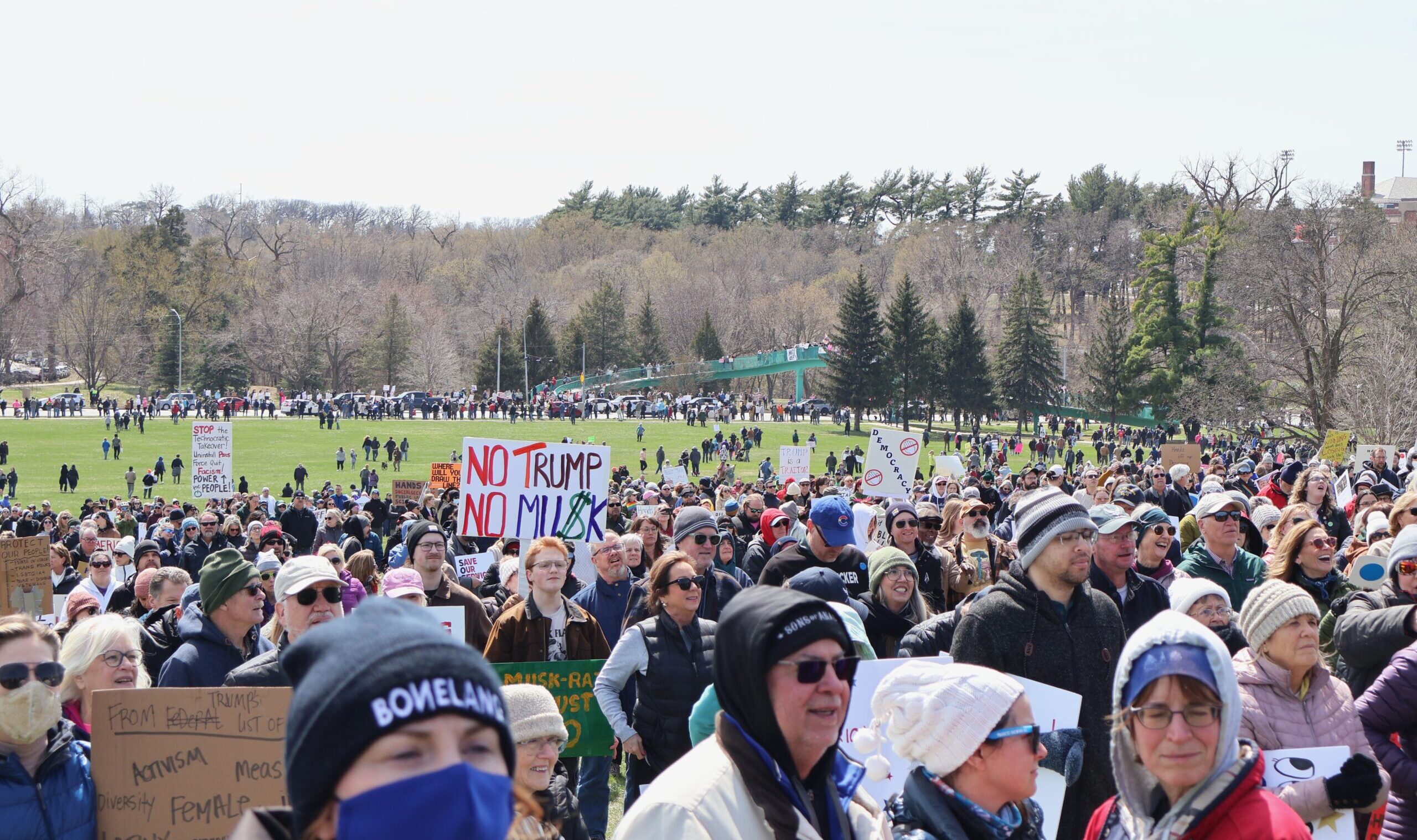 Protesters gather in central Omaha’s Memorial Park, across Dodge Street from the University of Nebraska at Omaha, on Saturday, April 5, 2025.<br />(Courtesy of Lucy Mason / The Gateway)