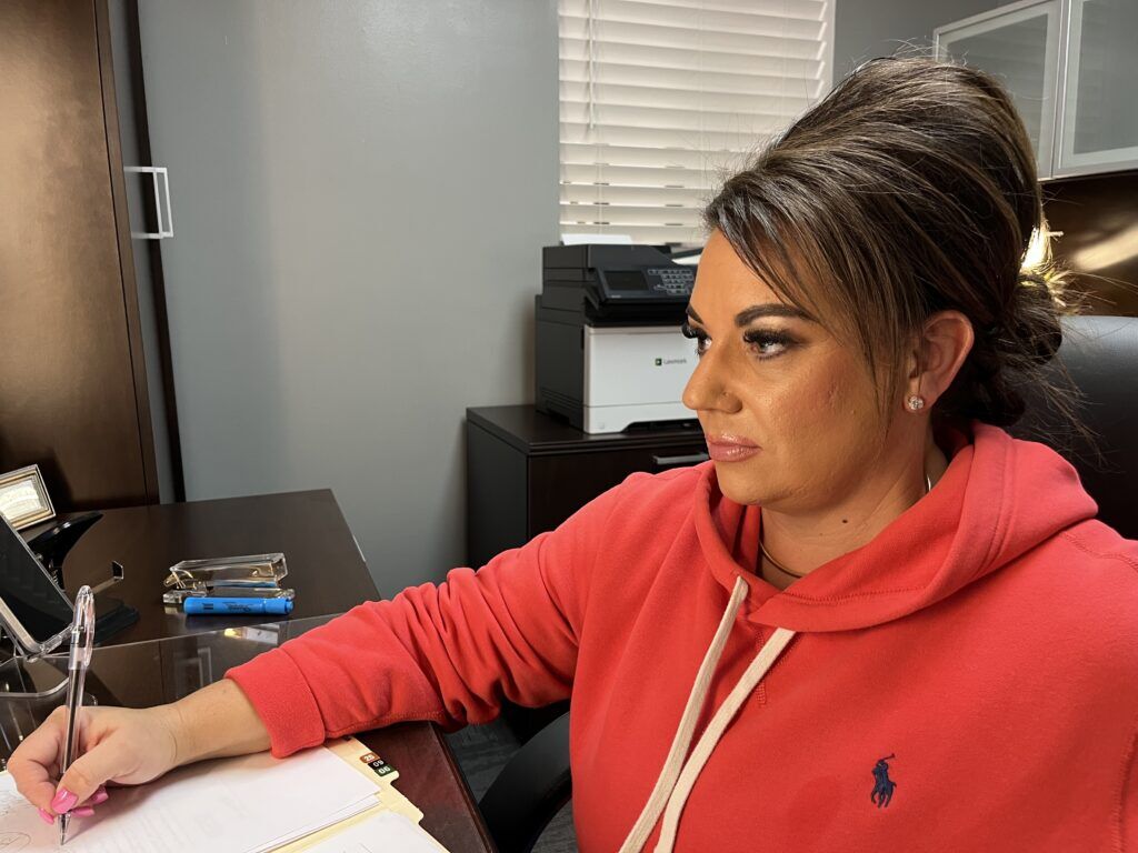 Mandi Sedlak became a board-certified mastectomy fitter six months after her now-husband, Jim Sedlak, hired her as an office administrator at his prosthetics clinic. The two now work in the same building in Kearney.<br />(Greg Echlin / Flatwater Free Press)