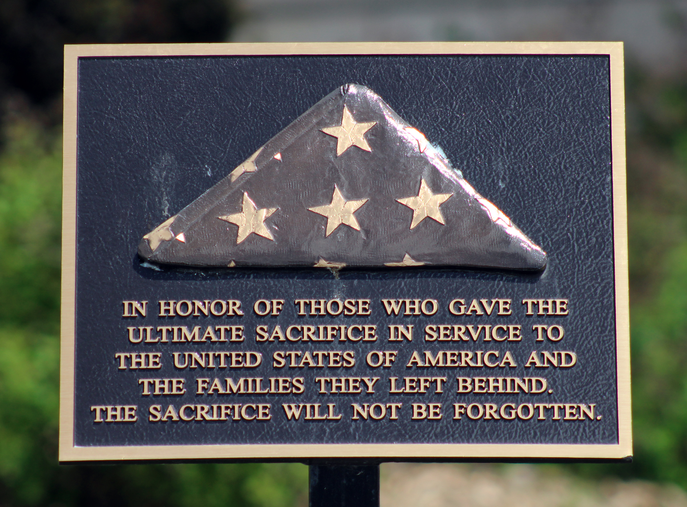 A plaque recognizes those servicemembers who gave their lives for their country. (Photo by Scott Stewart)
