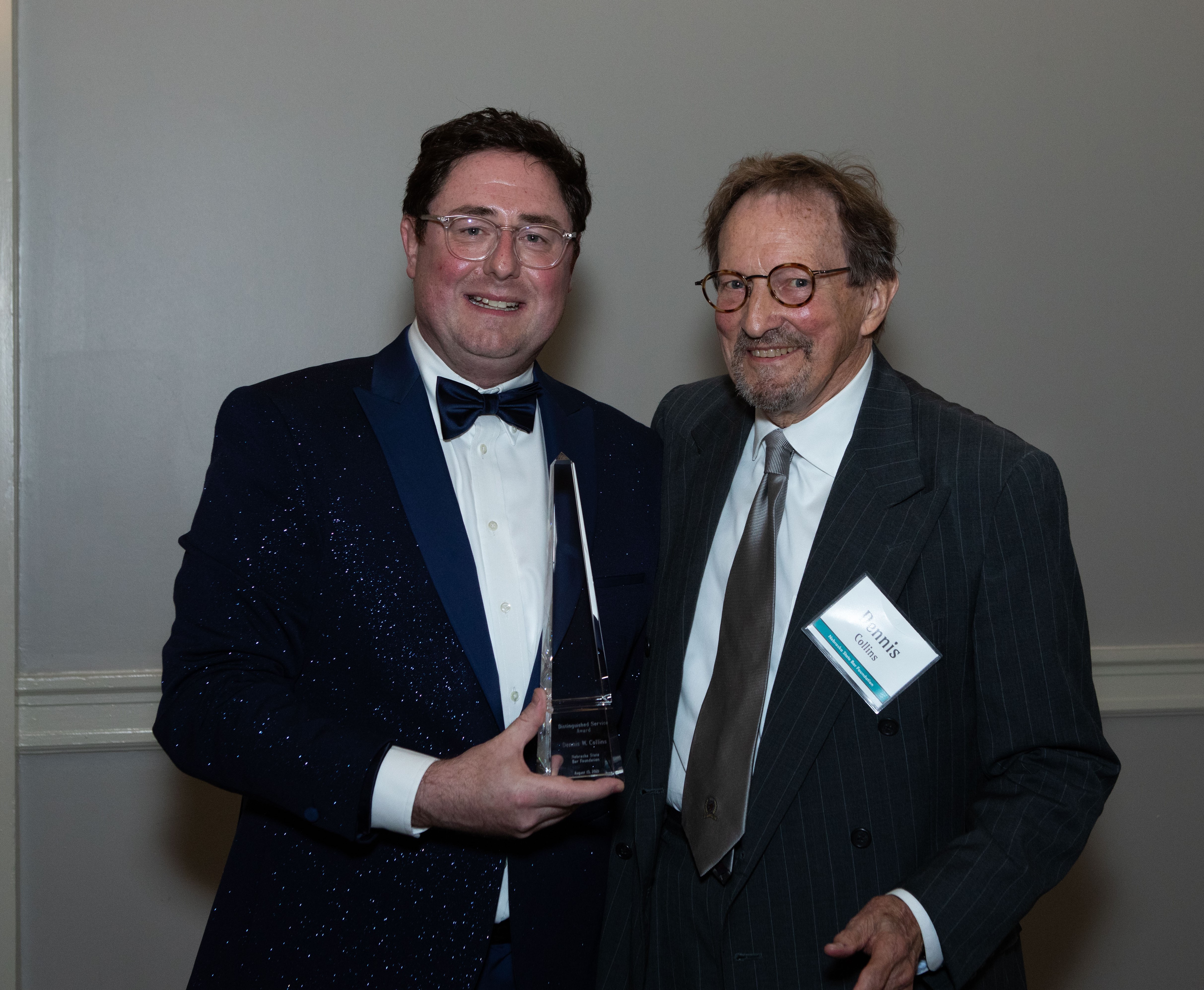 State Sen. Mike Flood presented his longtime colleague Dennis Collins with the Nebraska State Bar Foundation Distinguished Service Award at the Foundation’s Fellows Dinner in August. (NSBF)