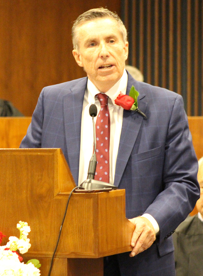 Stuart J. Dornan of Dornan Troia Howard Breitkreutz &amp; Conway delivers an address during the Omaha Bar Association’s annual Memorial Day Program in the legislative chamber of the Omaha-Douglas Civic Center on May 10, 2019. (Photo by Scott Stewart)