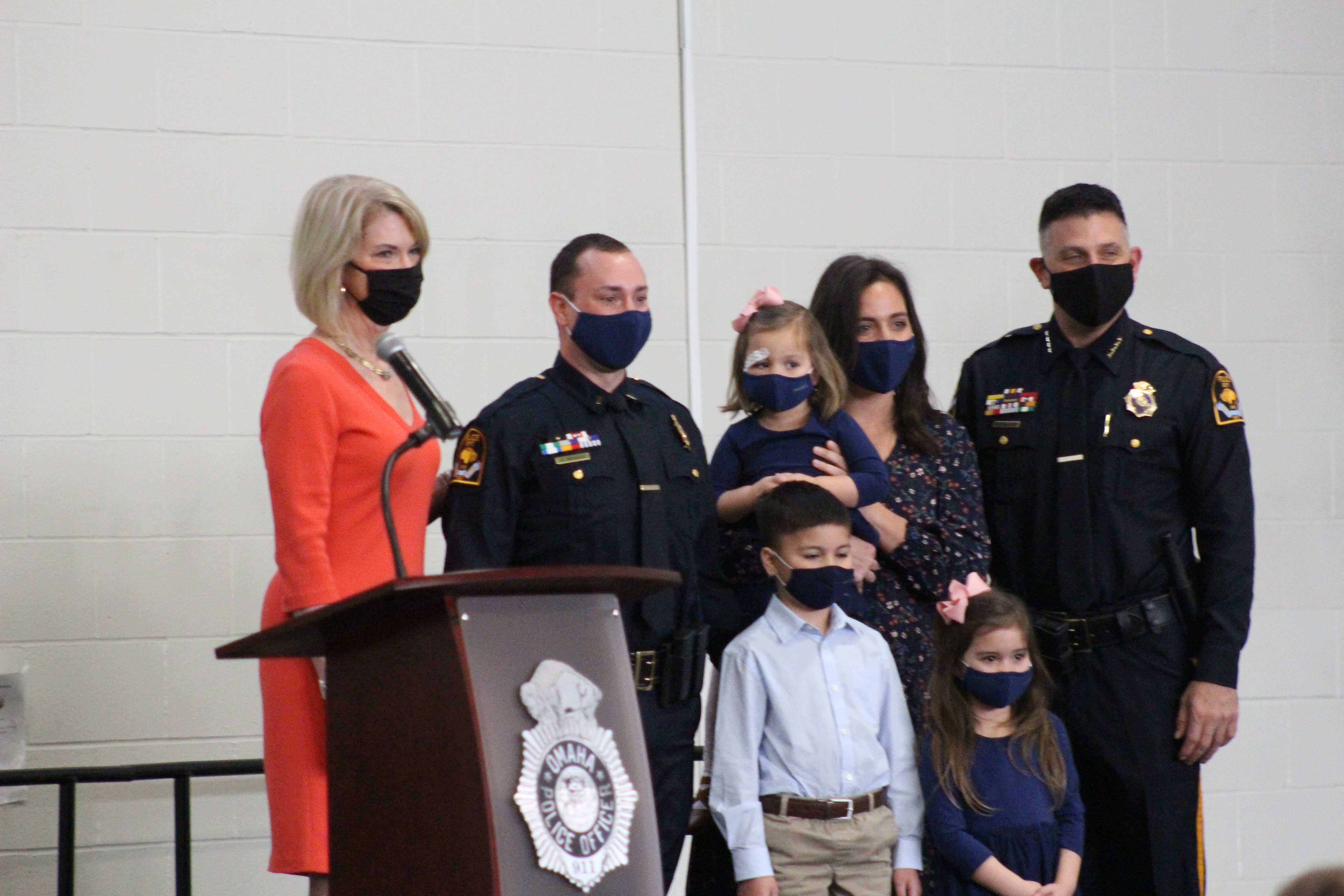Neal Bonacci, second from left, poses for photos with his family after being promoted to lieutenant at an Omaha Police Department promotion ceremony Friday, March 19, 2021. 	          (Derek Noehren/Daily Record)