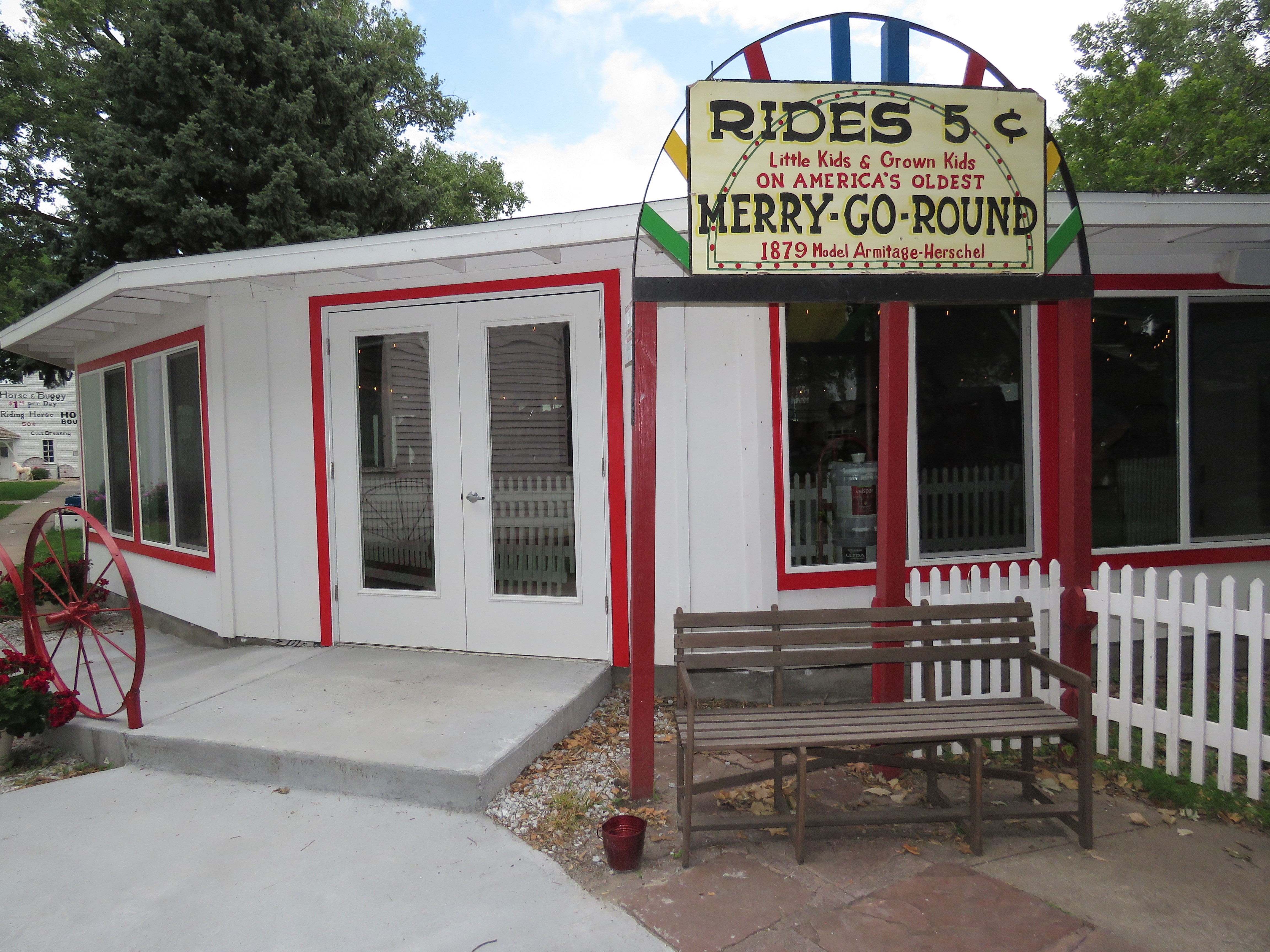 An RV volunteer made a new sign for the Pioneer Village carousel pavilion that was unveiled at the Aug. 9 grand reopening. Like this older sign, the new one says rides still cost a nickel.<br />(Lori Potter / Flatwater Free Press )